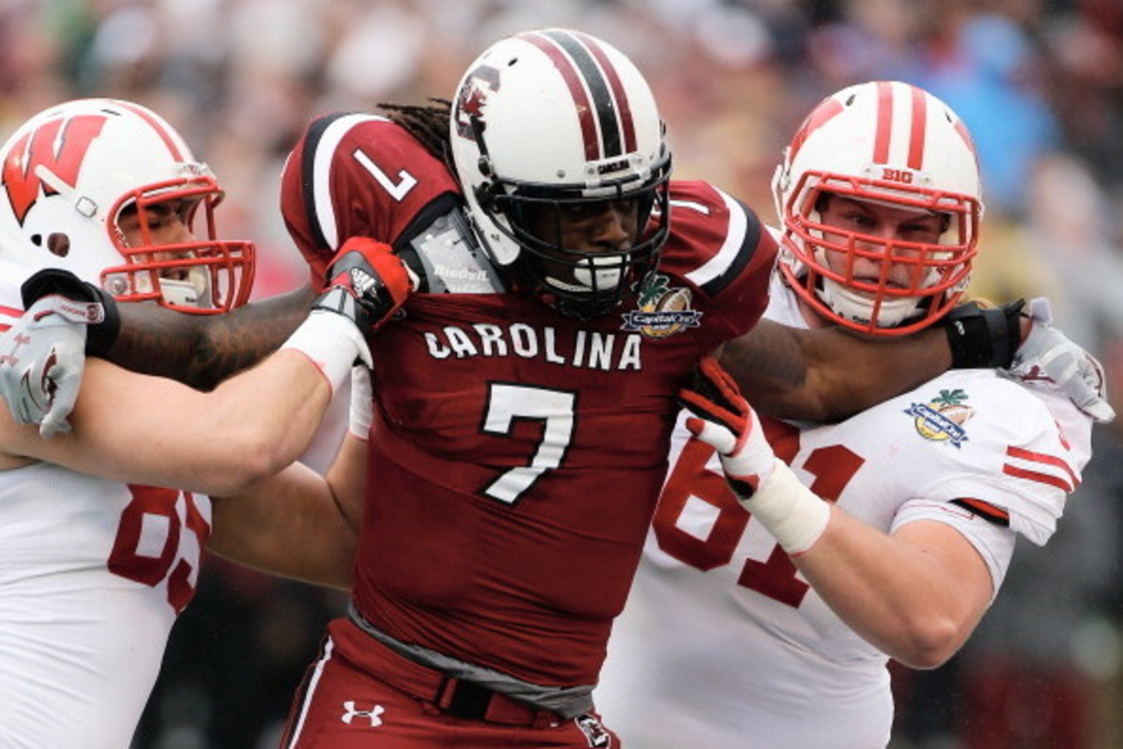 ORLANDO, FL - JANUARY 01:  Jadeveon Clowney #7 of the South Carolina Gamecocks in action during their game against the Wisconsin Badgers at the Capital One Bowl on January 1, 2014 in Orlando, Florida.  (Photo by Scott Halleran/Getty Images)