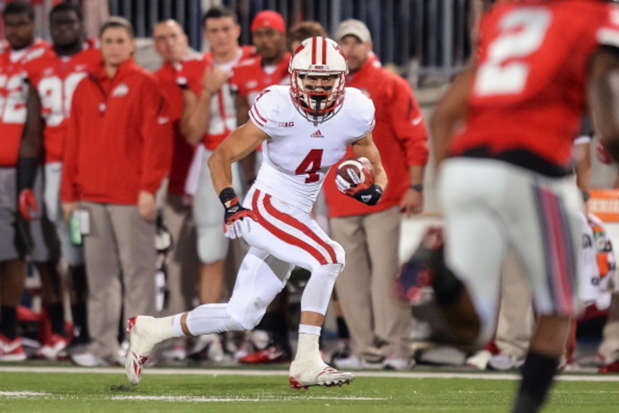 COLUMBUS, OH - SEPTEMBER 28: Jared Abbrederis #4 of the Wisconsin Badgers runs with the ball against the Ohio State Buckeyes at Ohio Stadium on September 28, 2013 in Columbus, Ohio. (Photo by Jamie Sabau/Getty Images) COLUMBUS, OH - SEPTEMBER 28: Jared Abbrederis #4 of the Wisconsin Badgers runs with the ball against the Ohio State Buckeyes at Ohio Stadium on September 28, 2013 in Columbus, Ohio. (Photo by Jamie Sabau/Getty Images)