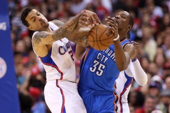 LOS ANGELES, CA - MAY 11:  Kevin Durant #35 of the Oklahoma City Thunder and Matt Barnes #22 of the Los Angeles Clippers fight for the ball in Game Four of the Western Conference Semifinals during the 2014 NBA Playoffs at Staples Center on May 11, 2014 in