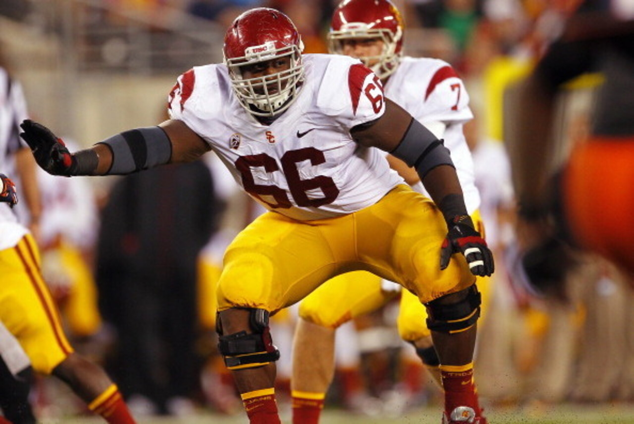 EAST RUTHERFORD, NJ - SEPTEMBER 08:  Marcus Martin #66 of the USC Trojans looks to block against the Syracuse Orange during a game at MetLife Stadium on September 8, 2012 in East Rutherford, New Jersey. (Photo by Rich Schultz/Getty Images)