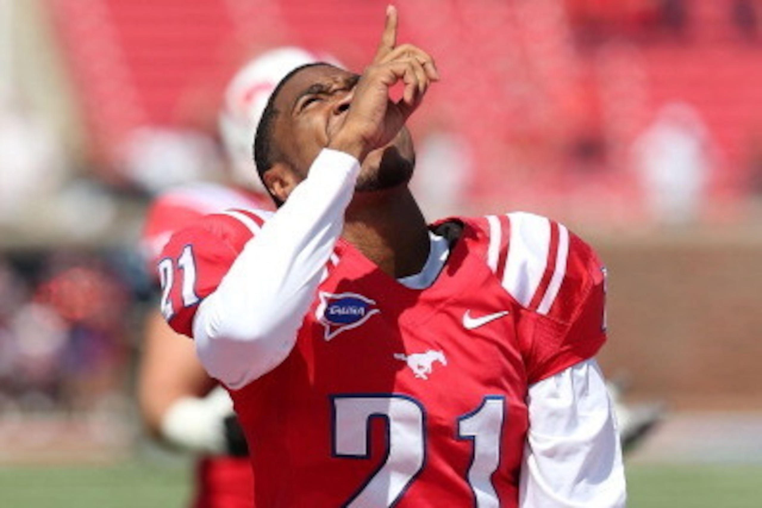 DALLAS, TX - SEPTEMBER 15:  Kenneth Acker #21 of the Southern Methodist Mustangs at Gerald J. Ford Stadium on September 15, 2012 in Dallas, Texas.  (Photo by Ronald Martinez/Getty Images)