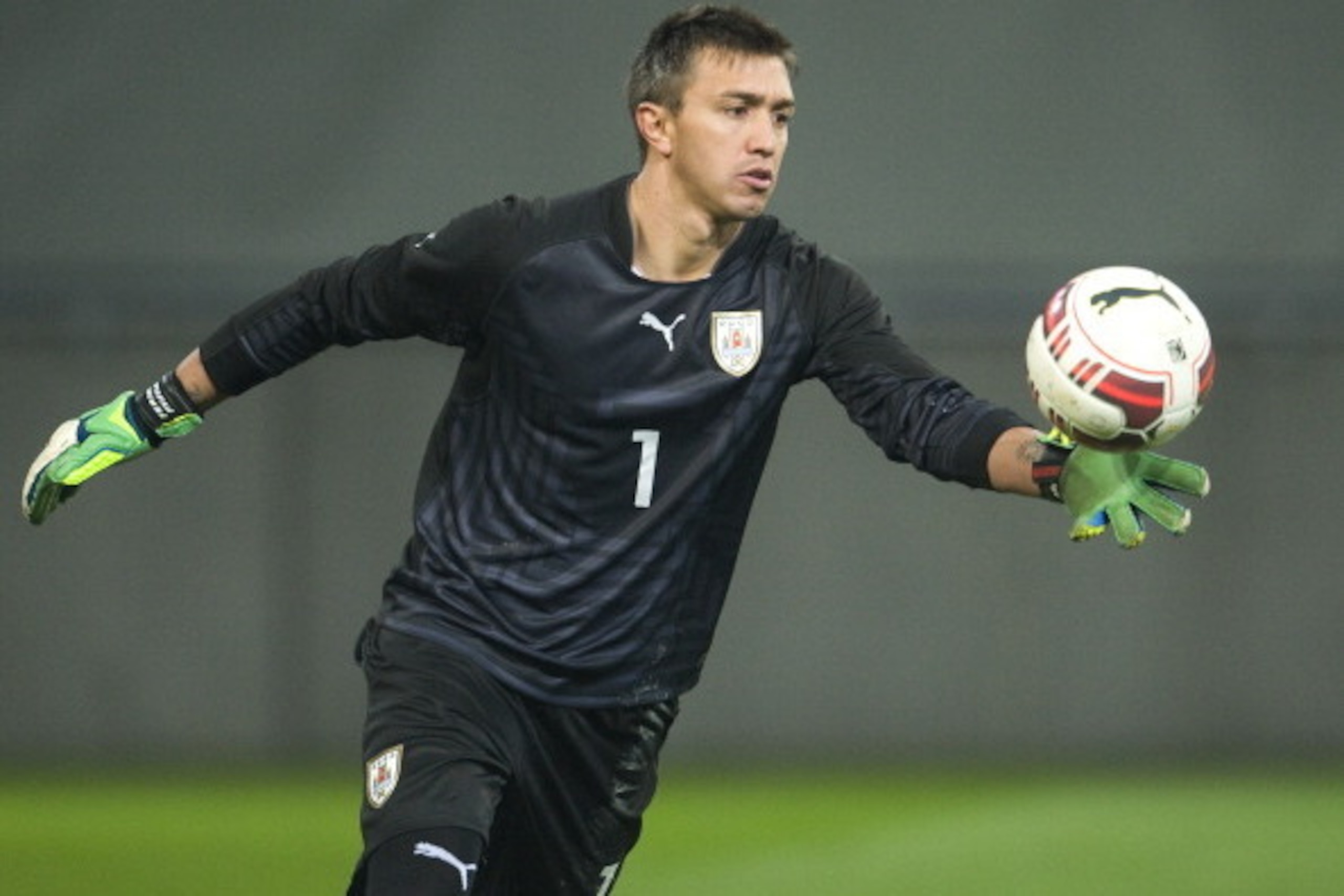 KLAGENFURT, AUSTRIA - MARCH 05:  Fernando Muslera of Uruguay during the international friendly match between Austria and Uruguay at Woerthersee stadium on March 5, 2014 in Klagenfurt, Austria.  (Photo by Winnie Pessentheiner/Getty Images)