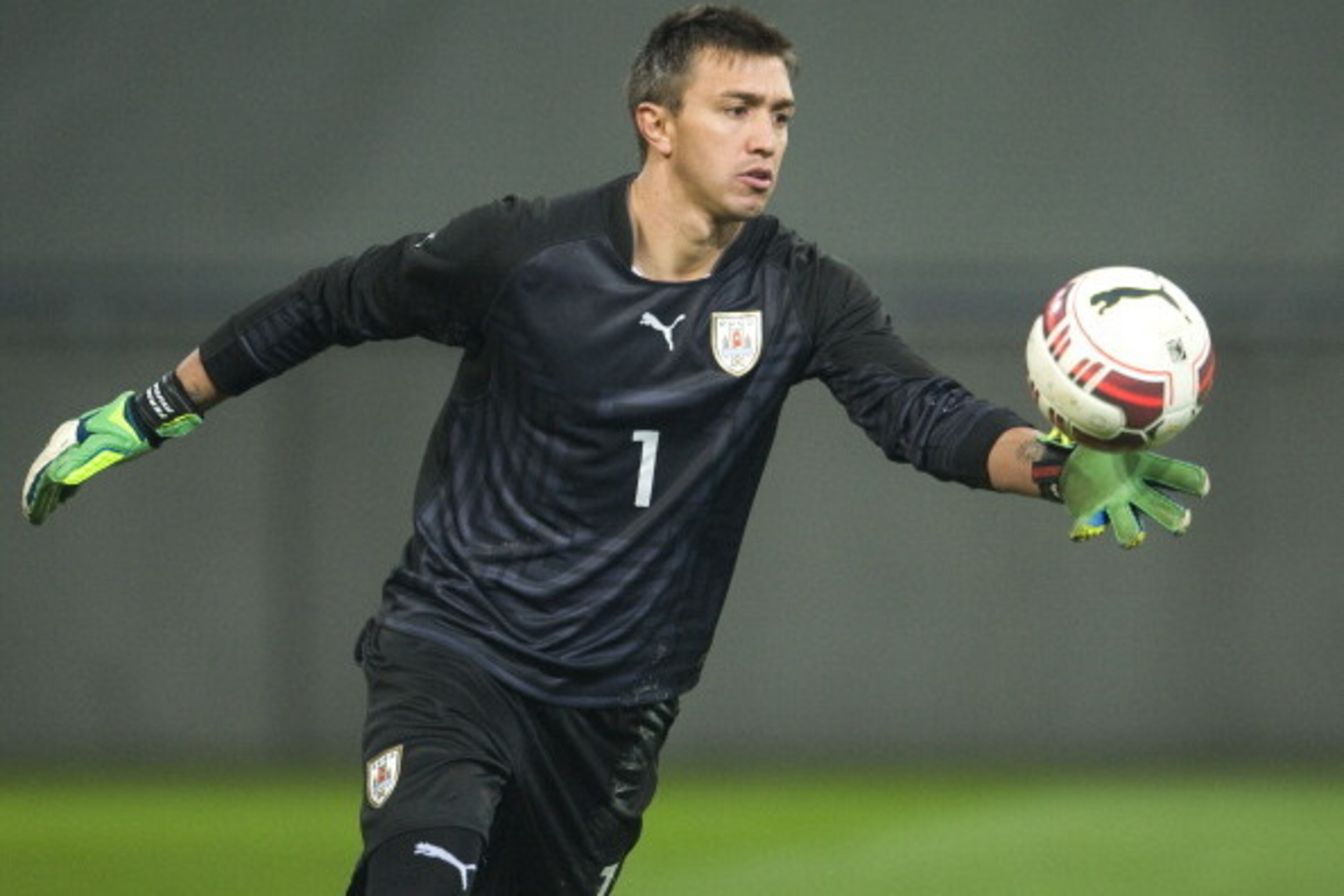 KLAGENFURT, AUSTRIA - MARCH 05:  Fernando Muslera of Uruguay during the international friendly match between Austria and Uruguay at Woerthersee stadium on March 5, 2014 in Klagenfurt, Austria.  (Photo by Winnie Pessentheiner/Getty Images)