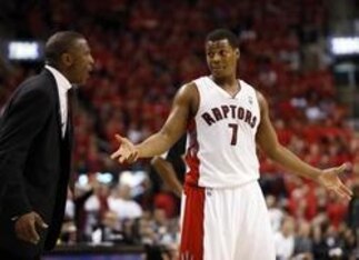 May 4, 2014; Toronto, Ontario, CAN; Toronto Raptors head coach Dwane Casey  and Toronto Raptors guard Kyle Lowry (7) reacts after a call in game seven of the first round of the 2014 NBA Playoffs against the Brooklyn Nets at the Air Canada Centre. Brooklyn