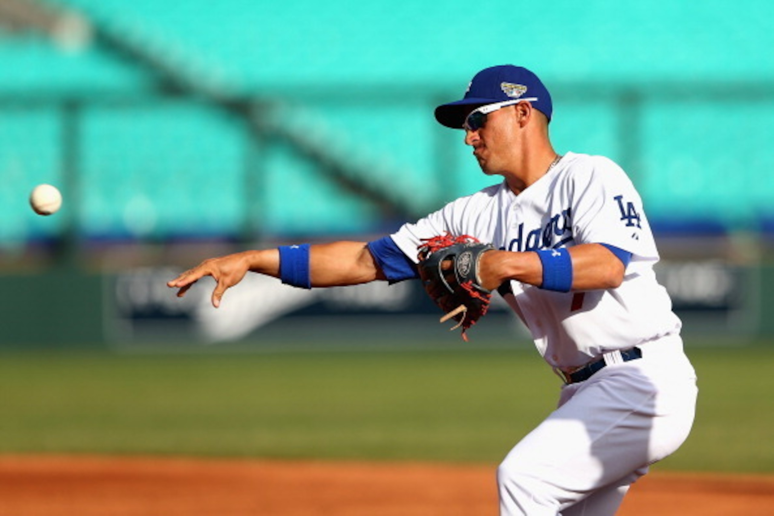 SYDNEY, AUSTRALIA - MARCH 19: Alex Guerrero of the Dodgers fields during a Los Angeles MLB training session at Sydney Cricket Ground on March 19, 2014 in Sydney, Australia.  (Photo by Cameron Spencer/Getty Images)