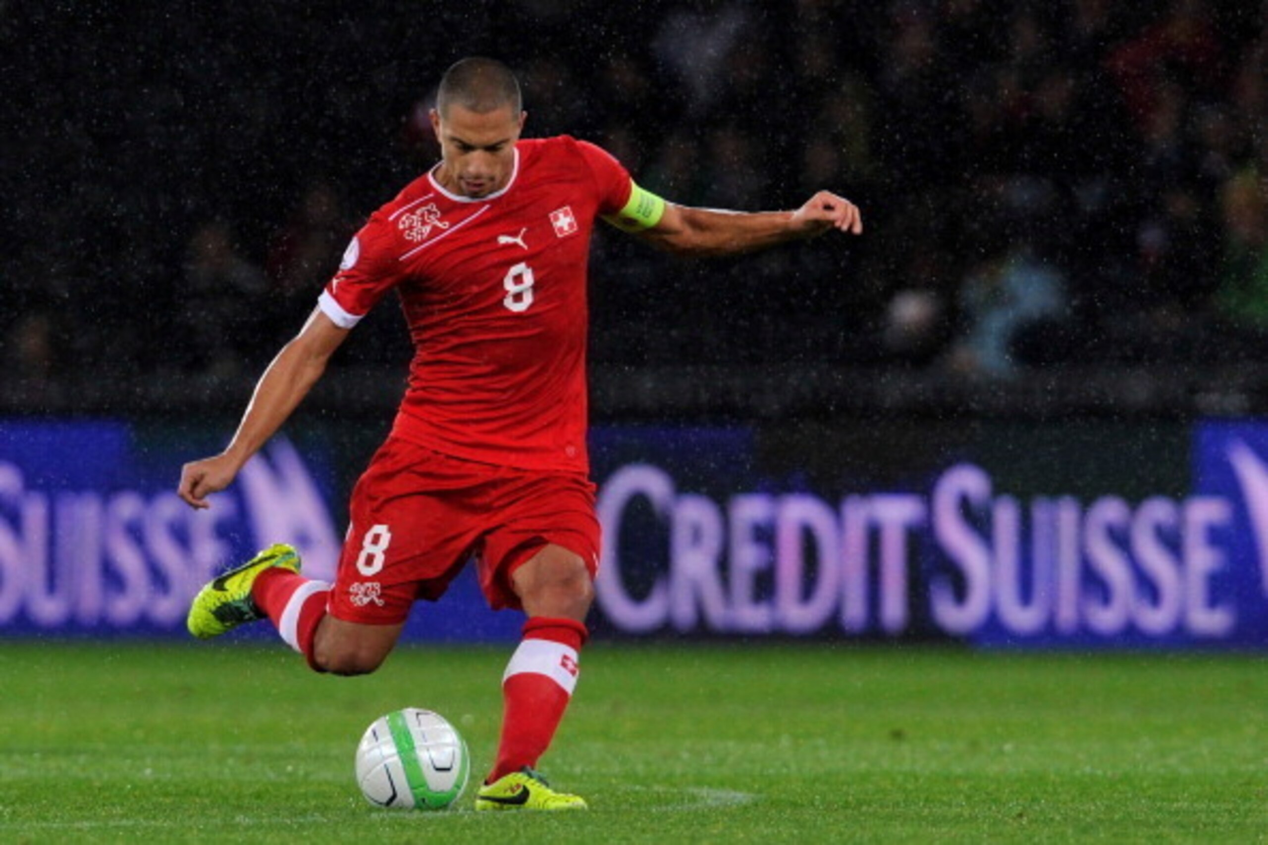 BERN, SWITZERLAND - OCTOBER 15:  Gokhan Inler of Switzerland in action during the FIFA 2014 World Cup Qualifier match between Switzerland and Slovenia match held at Stade de Suisse on October 15, 2013 in Bern, Switzerland.  (Photo by Harold Cunningham/Get