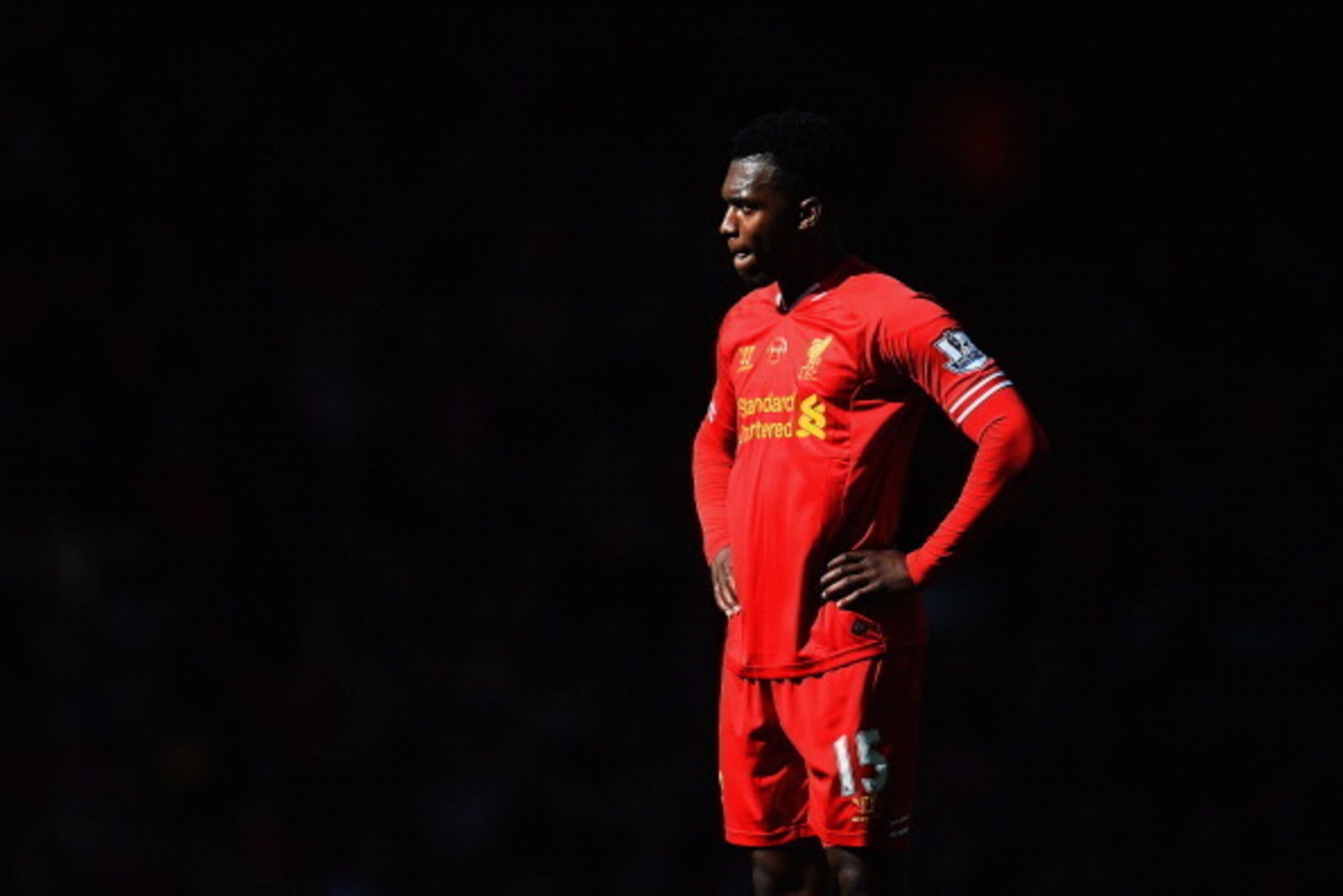 LIVERPOOL, ENGLAND - MAY 11:  Daniel Sturridge of Liverpool looks thoughtful during the Barclays Premier League match between Liverpool and Newcastle United at Anfield on May 11, 2014 in Liverpool, England.  (Photo by Laurence Griffiths/Getty Images)