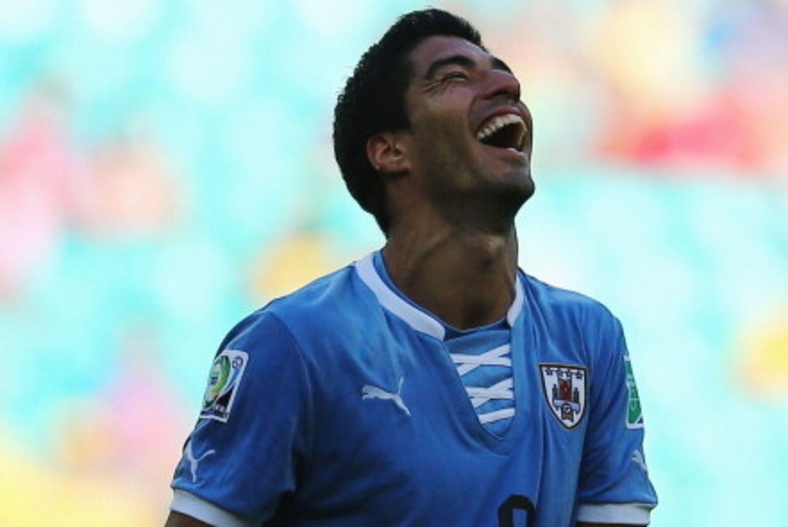 SALVADOR, BRAZIL - JUNE 30:  Luis Suarez of Uruguay reacts during the FIFA Confederations Cup Brazil 2013 3rd Place match between Uruguay and Italy at Estadio Octavio Mangabeira (Arena Fonte Nova Salvador) on June 30, 2013 in Salvador, Brazil.  (Photo by 
