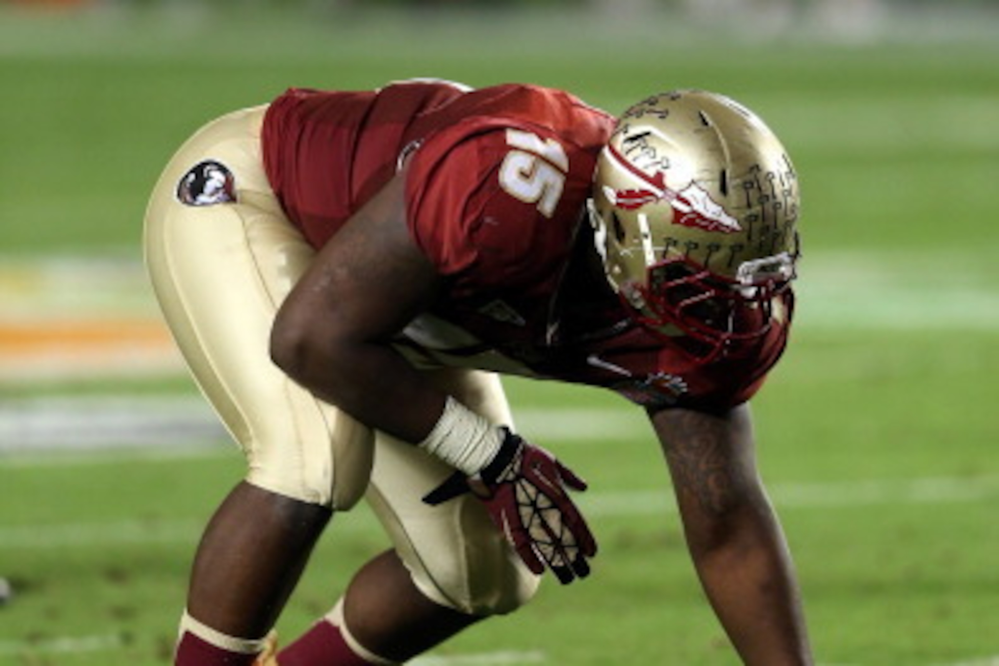 MIAMI GARDENS, FL - JANUARY 01:  Mario Edwards Jr. #15 of the Florida State Seminoles lines up on defense against the Northern Illinois Huskies during the Discover Orange Bowl at Sun Life Stadium on January 1, 2013 in Miami Gardens, Florida.  (Photo by St
