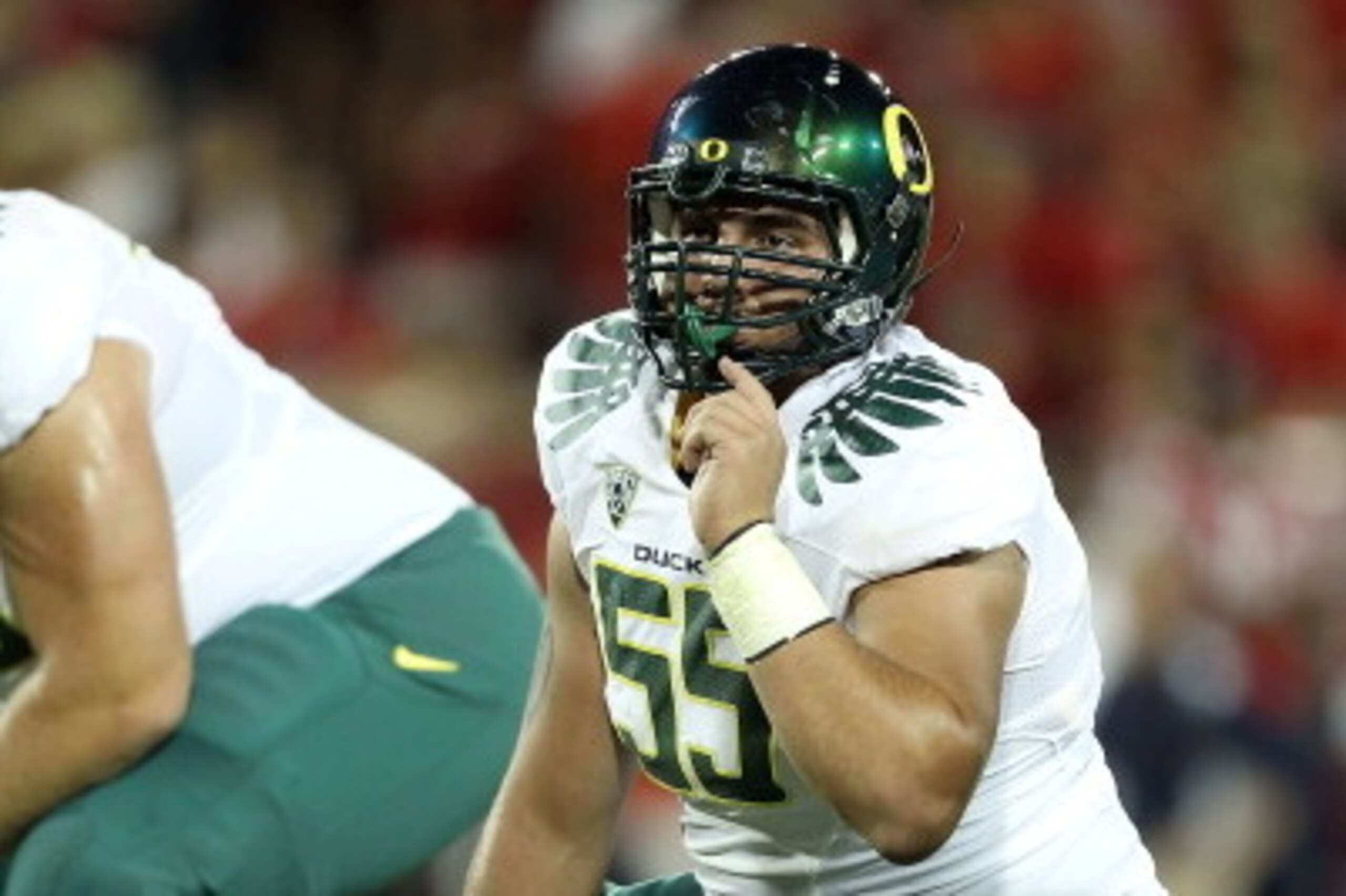 TUCSON, AZ - SEPTEMBER 24:  Offensive lineman Hroniss Grasu #55 of the Oregon Ducks during the college football game against the Arizona Wildcats at Arizona Stadium on September 24, 2011 in Tucson, Arizona.  The Ducks defeated the Wildcats 56-31.  (Photo 
