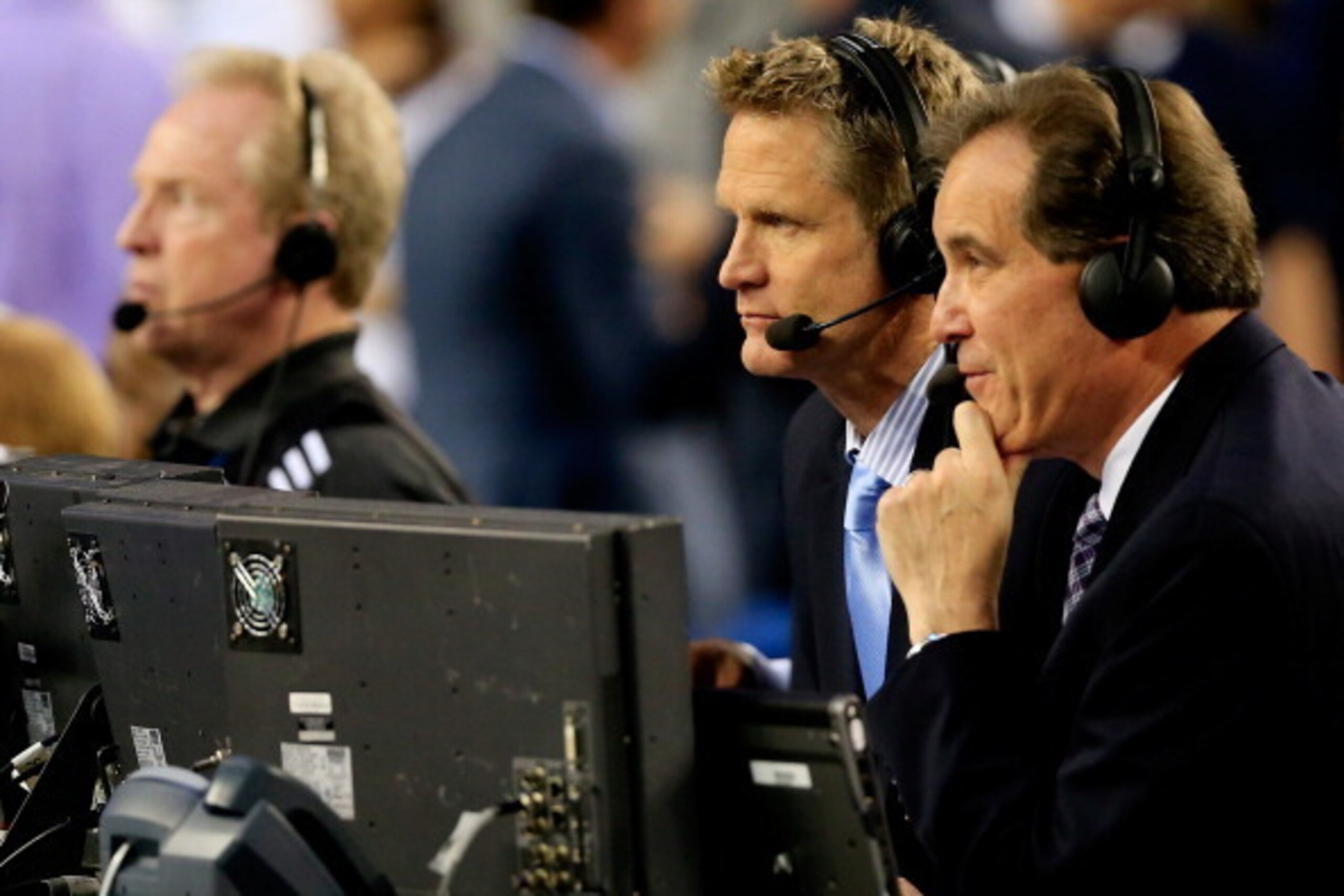 ARLINGTON, TX - APRIL 07: Broadcast personality Steve Kerr looks on during the NCAA Men's Final Four Championship between the Kentucky Wildcats and the Connecticut Huskies at AT&T Stadium on April 7, 2014 in Arlington, Texas.  (Photo by Jamie Squire/Getty