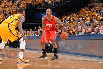 INDIANAPOLIS, IN - MAY 03: Jeff Teague #0 of the Atlanta Hawks dribbles the ball against the Indiana Pacers during game Seven of the Eastern Conference Playoffs at the Bankers Life Fieldhouse on May 3, 2014 in Indianapolis, Indiana. NOTE TO USER: User exp