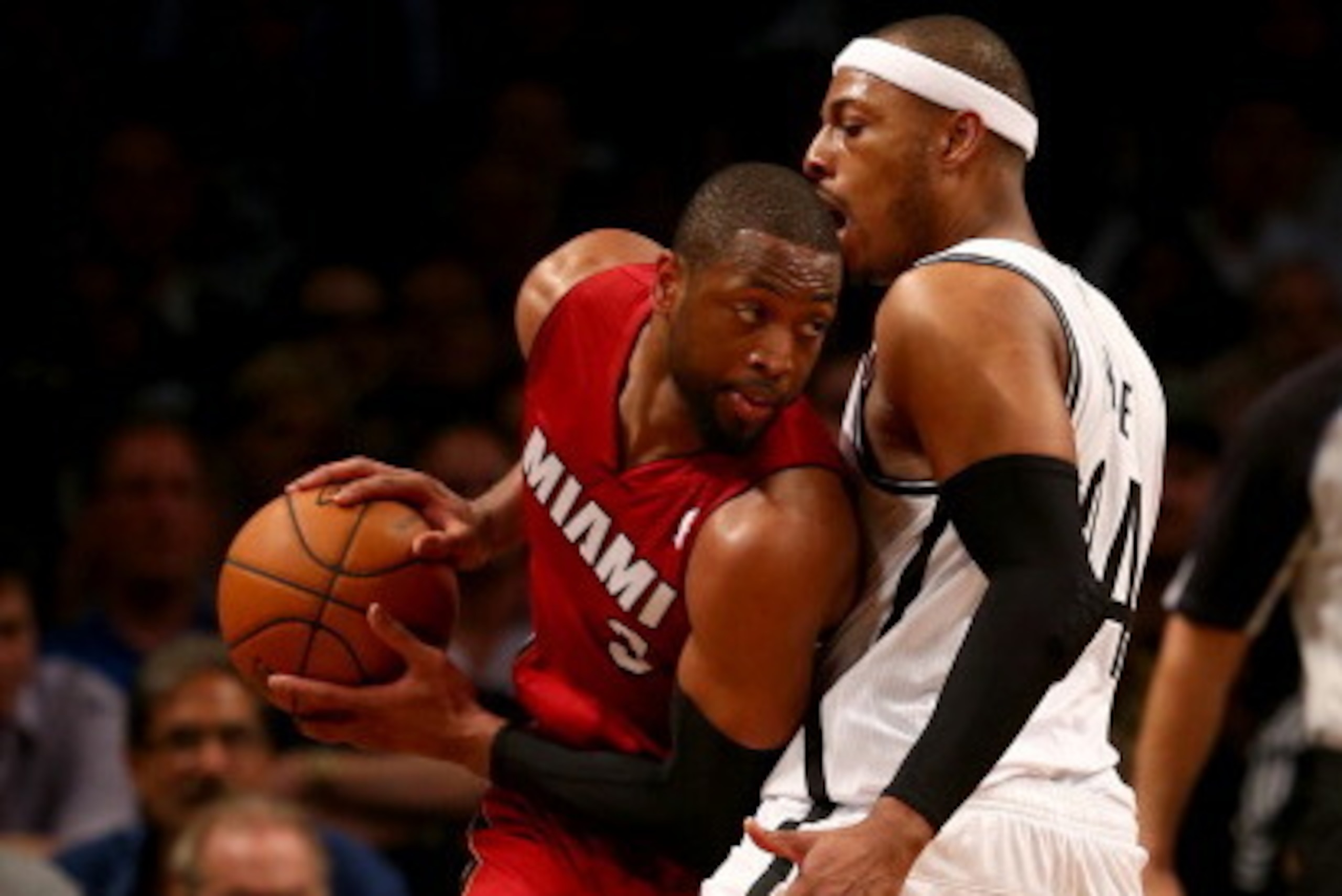 NEW YORK, NY - MAY 12:  Dwyane Wade #3 of the Miami Heat tries to get around Paul Pierce #34 of the Brooklyn Nets in the second half in Game Four of the Eastern Conference Semifinals during the 2014 NBA Playoffs at the Barclays Center on May 12, 2014 in t