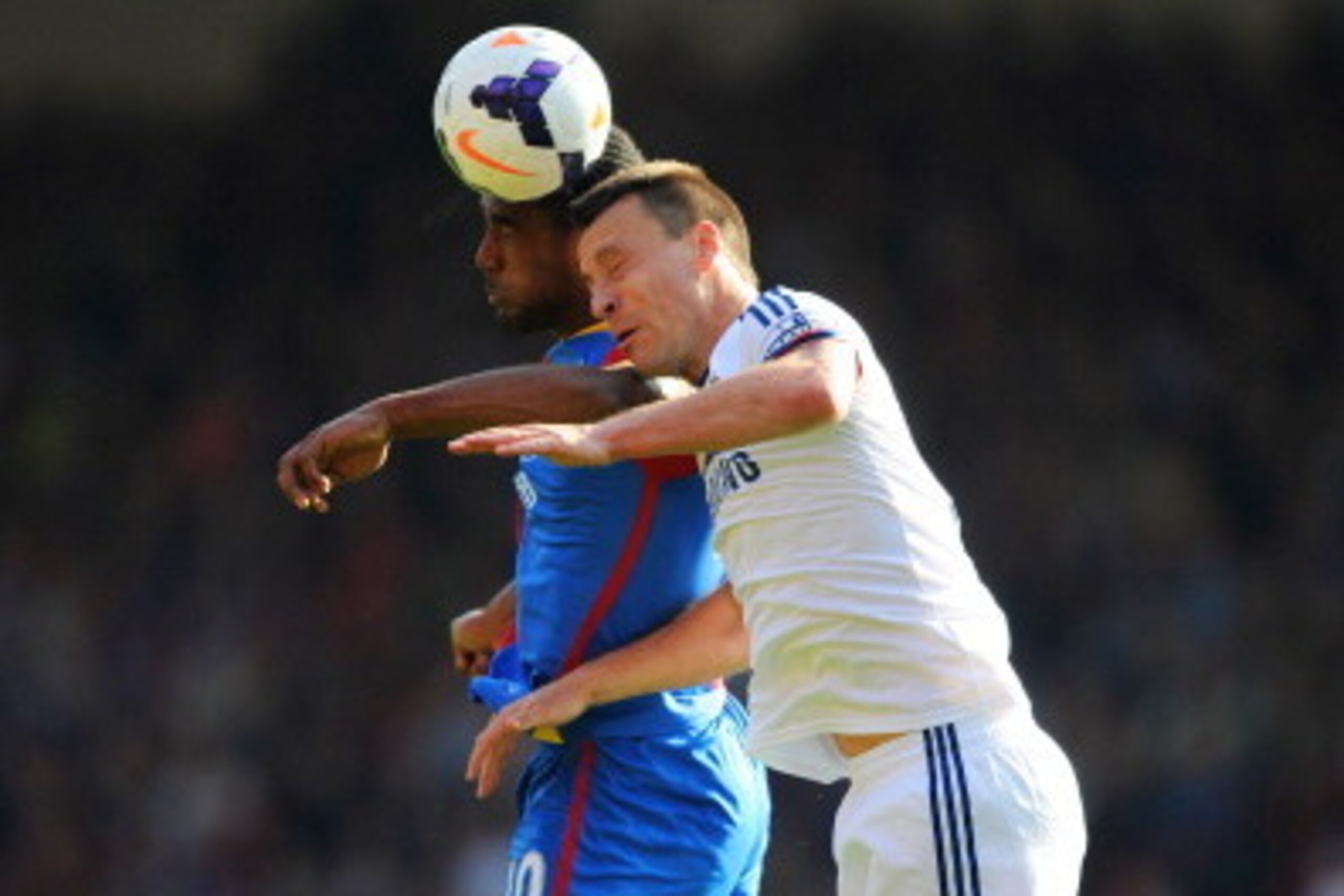 LONDON, ENGLAND - MARCH 29:  Cameron Jerome of Crystal Palace and John Terry of Chelsea compete for a header during the Barclays Premier League match between Crystal Palace and Chelsea at Selhurst Park on March 29, 2014 in London, England.  (Photo by Stev