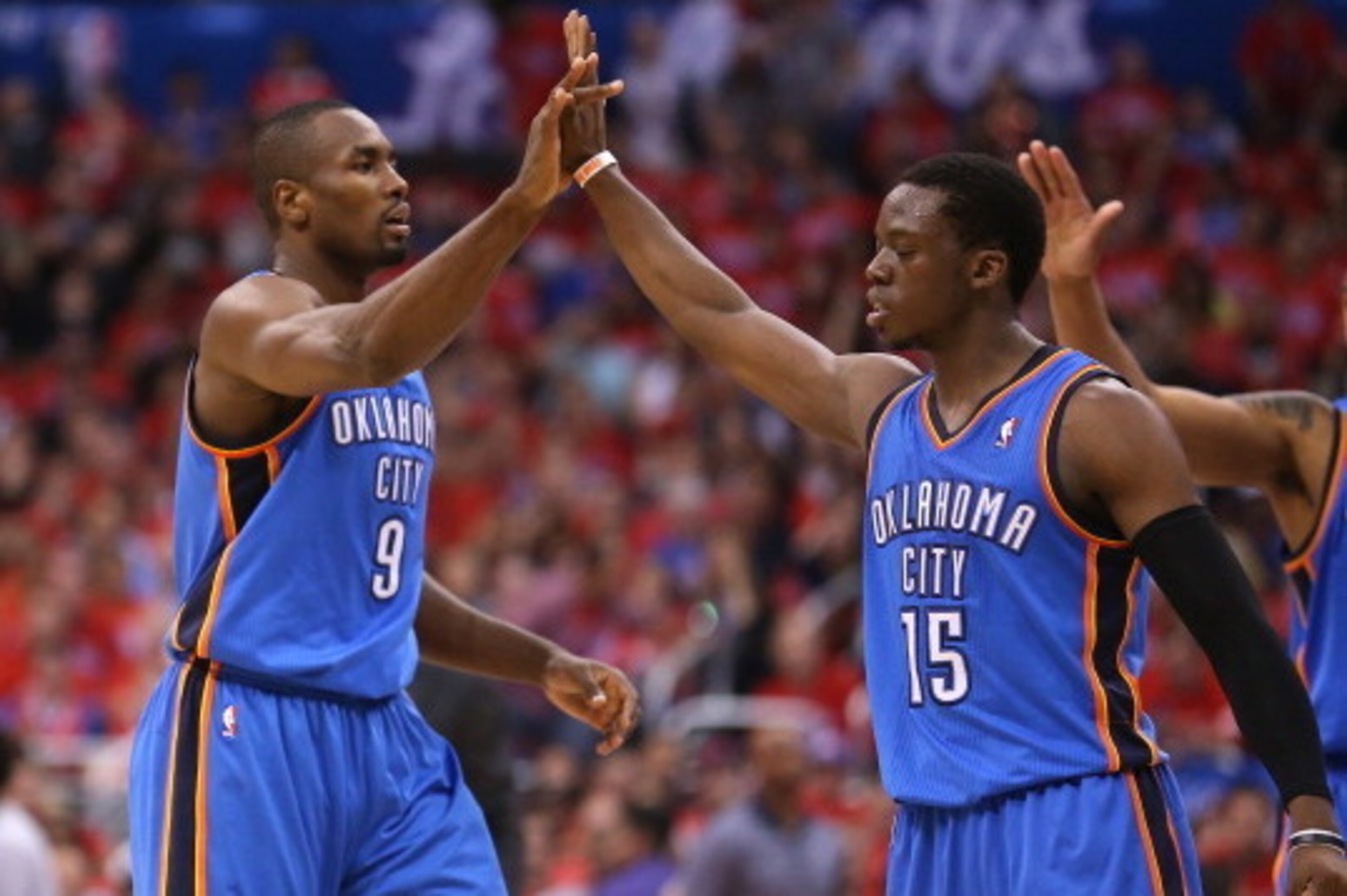 LOS ANGELES, CA - MAY 09:  Serge Ibaka #9 and Reggie Jackson #15 of the Oklahoma City Thunder high five against the Los Angeles Clippers in Game Three of the Western Conference Semifinals during the 2014 NBA Playoffs at Staples Center on May 9, 2014 in Lo