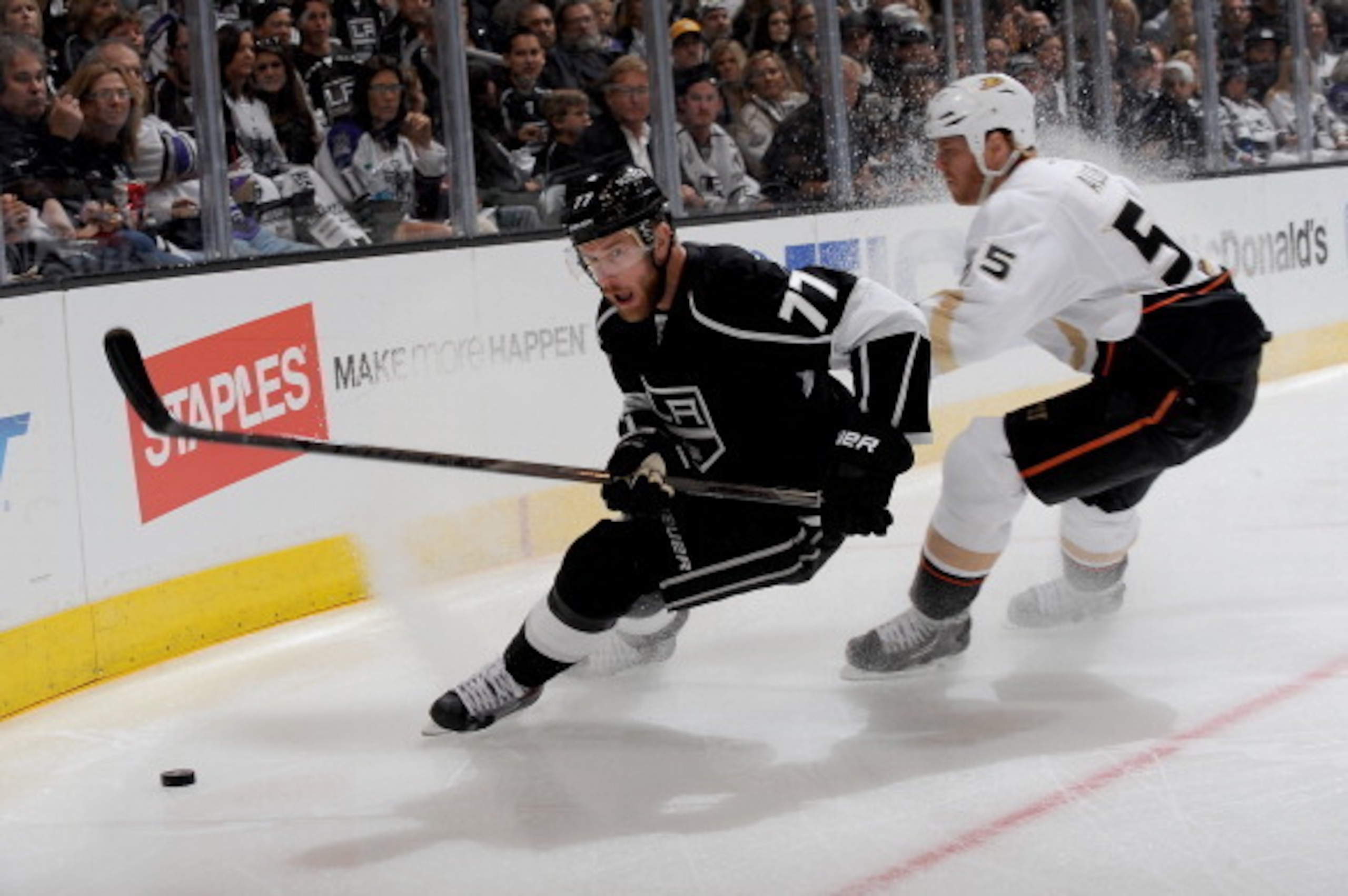 LOS ANGELES, CA - MAY 10:  Jeff Carter #77 of the Los Angeles Kings skates with the puck against Bryan Allen #55 of the Anaheim Ducks in Game Four of the Second Round of the 2014 Stanley Cup Playoffs at Staples Center on May 10, 2014 in Los Angeles, Calif