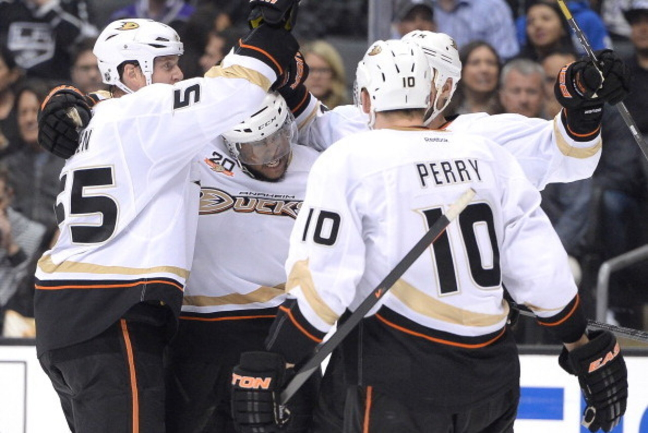 LOS ANGELES, CA - MAY 10:  Devante Smith-Pelly #77 of the Anaheim Ducks celebrates his goal with Bryan Allen #55 and Corey Perry #10 to take a 1-0 lead over the Los Angeles Kings during the first period in Game Four of the Second Round of the 2014 NHL Sta