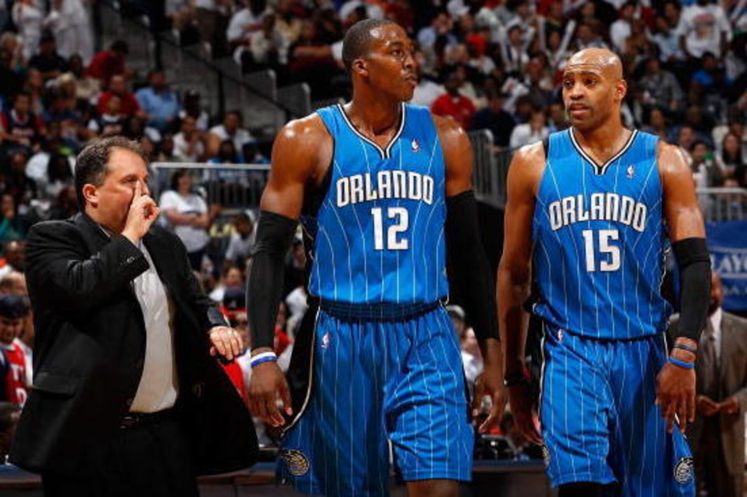 ATLANTA - MAY 10:  Head coach Stan Van Gundy, Dwight Howard #12 and Vince Carter #15 of the Orlando Magic against the Atlanta Hawks during Game Four of the Eastern Conference Semifinals of the 2010 NBA Playoffs at Philips Arena on May 10, 2010 in Atlanta,