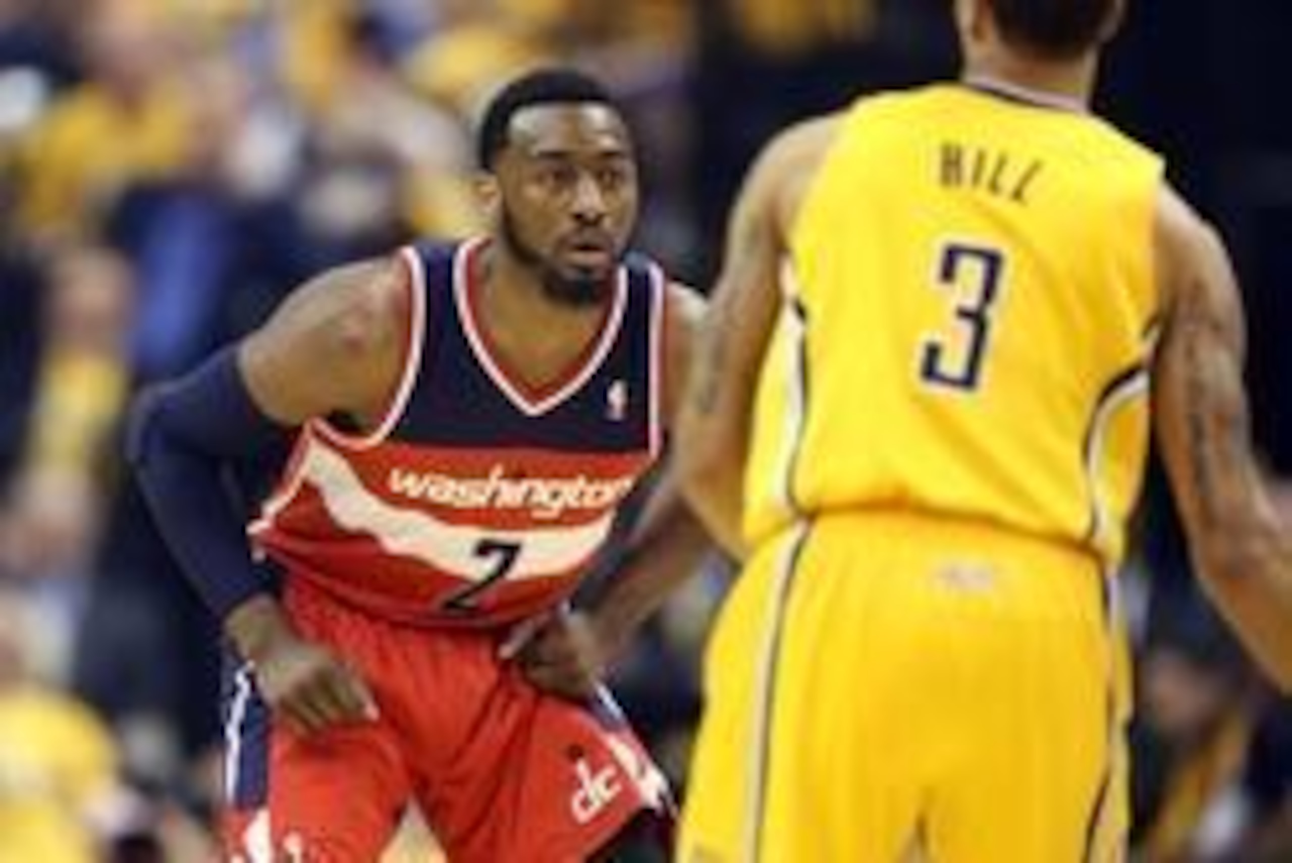 May 5, 2014; Indianapolis, IN, USA; Indiana Pacers guard George Hill (3) is guarded by Washington Wizards guard John Wall (2) in game one of the second round of the 2014 NBA Playoffs at Bankers Life Fieldhouse. Mandatory Credit: Brian Spurlock-USA TODAY S
