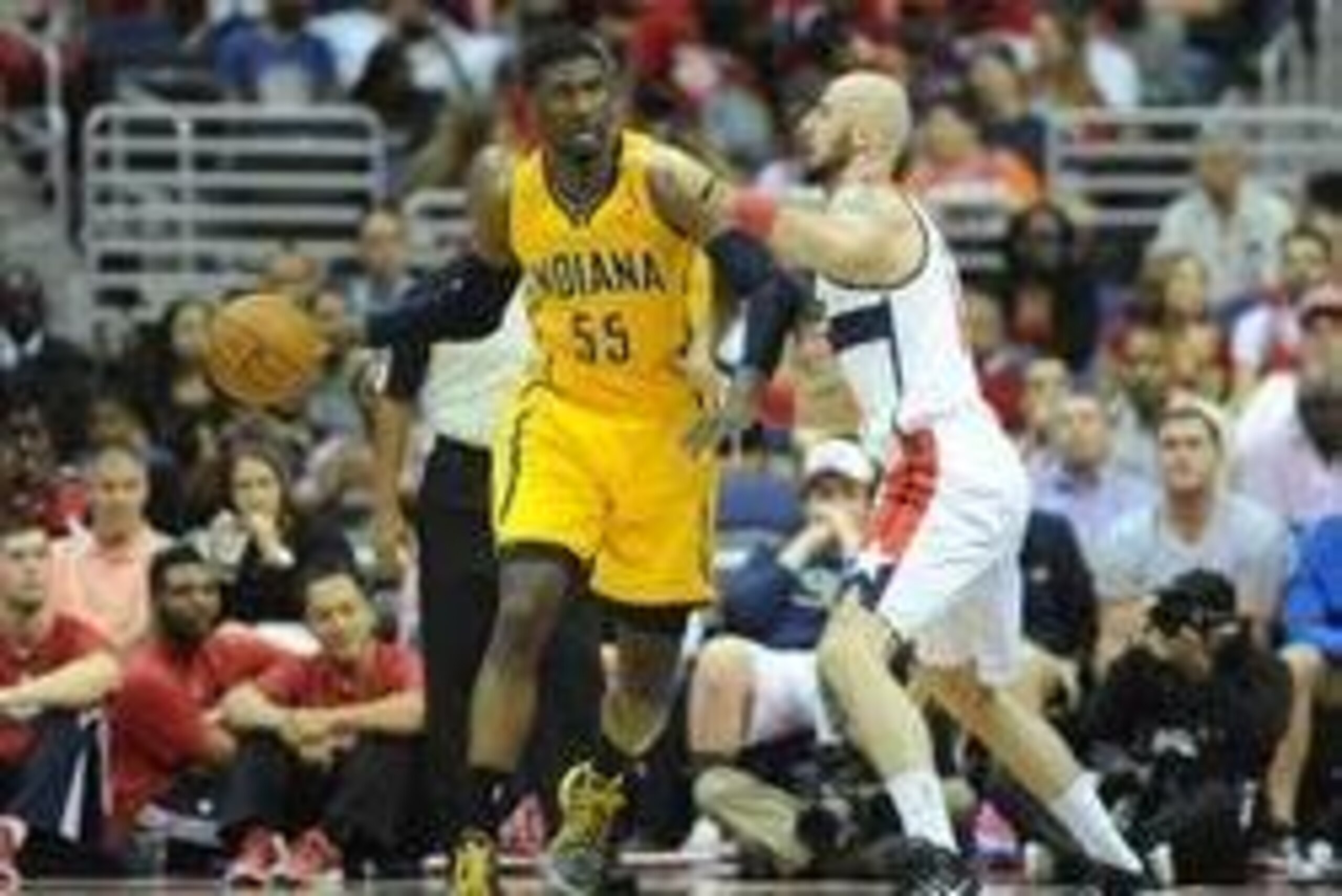 May 11, 2014; Washington, DC, USA; Indiana Pacers center Roy Hibbert (55) dribbles the ball as Washington Wizards center Marcin Gortat (4) defends during the second half in game four of the second round of the 2014 NBA Playoffs at Verizon Center. The Pace