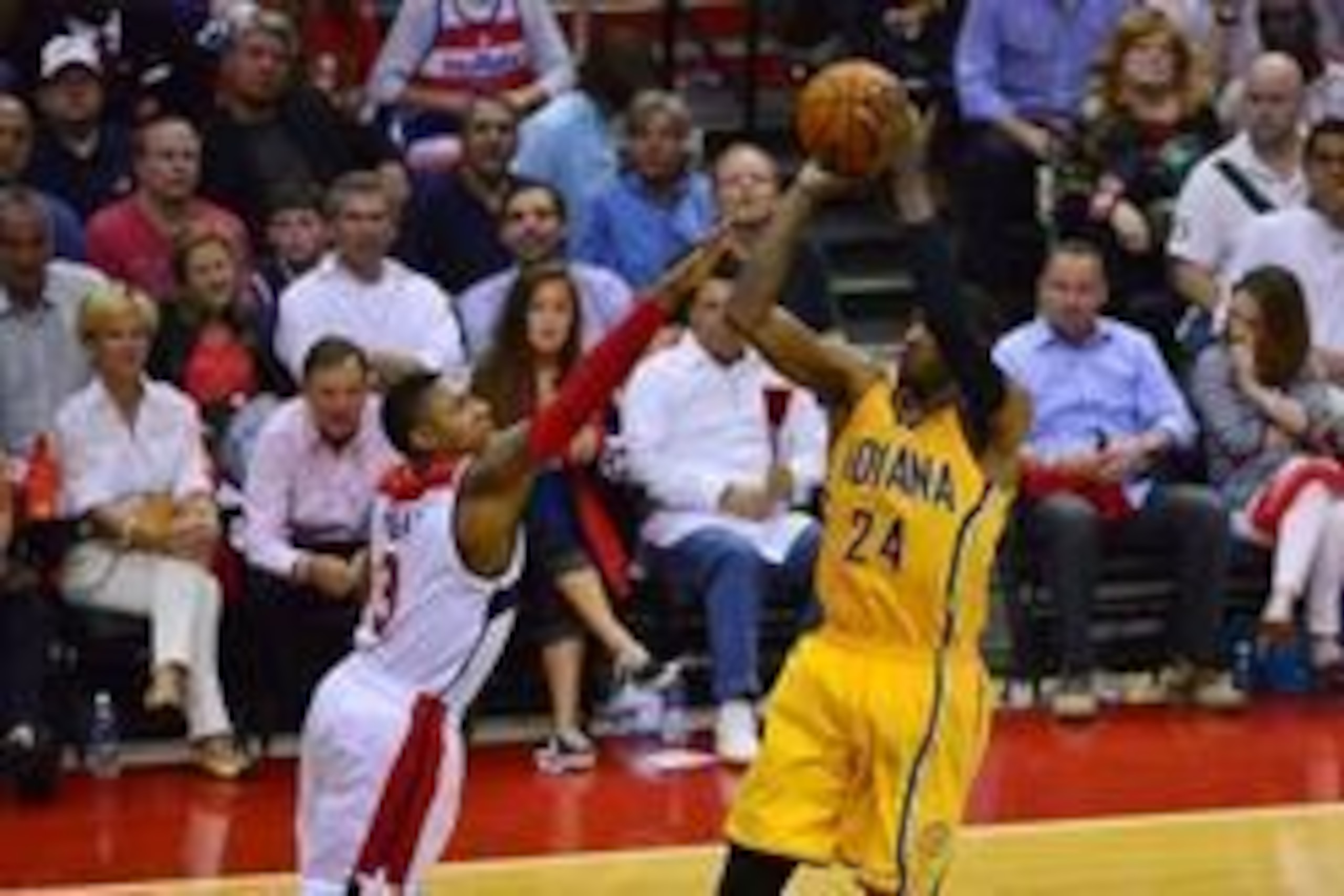 May 11, 2014; Washington, DC, USA;Indiana Pacers forward Paul George (24) shoots a jump shot over Washington Wizards guard Bradley Beal (3) during the fourth quarter of  game four of the second round of the 2014 NBA Playoffs at Verizon Center. Indiana Pac