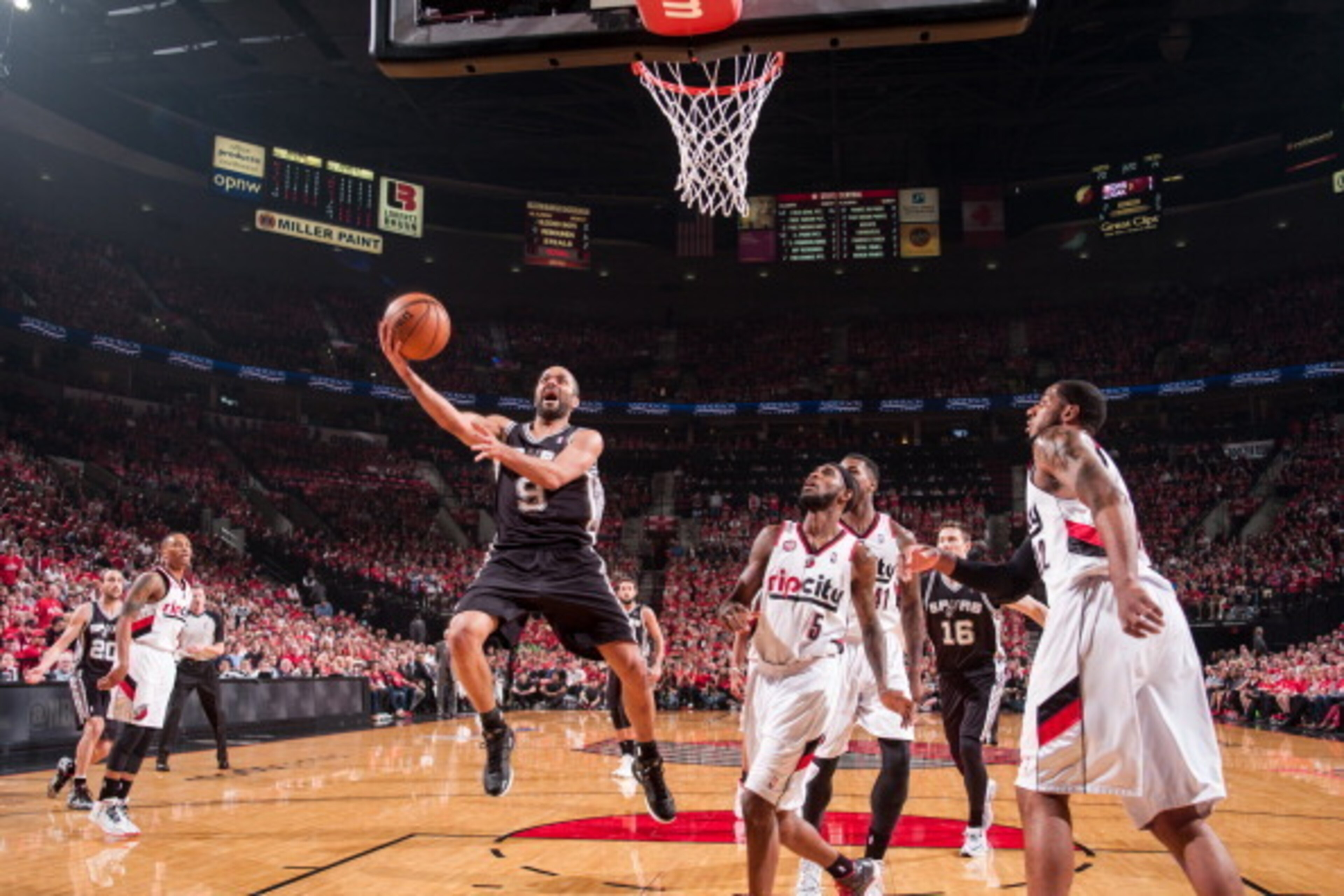 PORTLAND, OR - MAY 12:  Tony Parker #9 of the San Antonio Spurs drives to the basket against the Portland Trail Blazers in Game Four of the Western Conference Semifinals during the 2014 NBA Playoffs on May 12, 2014 at the Moda Center in Portland, Oregon. 