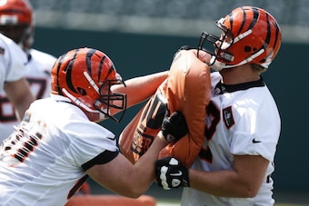 CINCINNATI, OH - MAY 12: Offensive linemen Tanner Hawkinson #72 and T.J. Johnson #60 of the Cincinnati Bengals work out during a rookie camp at Paul Brown Stadium on May 12, 2013 in Cincinnati, Ohio. (Photo by Joe Robbins/Getty Images)