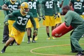 Jun 11, 2013; Green Bay, WI, USA; Green Bay Packers cornerback Micah Hyde works out during organized team activities at Clarke Hinkle Field in Green Bay. Mandatory Credit: Benny Sieu-USA TODAY Sports