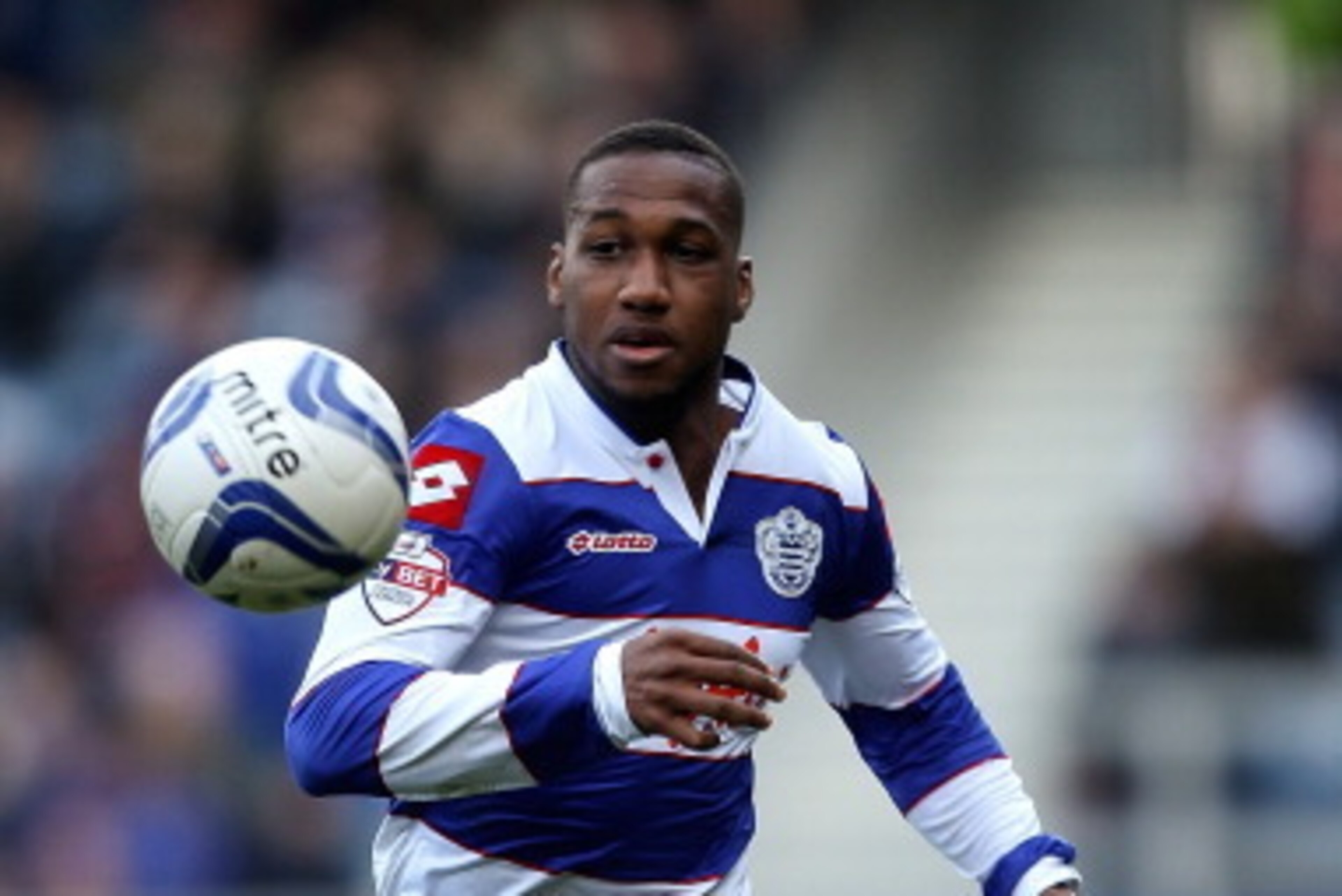 LONDON, ENGLAND - MARCH 01: Junior Hoilett of QPR in action during the Sky Bet Championship match between Queens Park Rangers and Leeds United at Loftus Road on March 1, 2014 in London, England. (Photo by Ben Hoskins/Getty Images) LONDON, ENGLAND - MARCH 01: Junior Hoilett of QPR in action during the Sky Bet Championship match between Queens Park Rangers and Leeds United at Loftus Road on March 1, 2014 in London, England. (Photo by Ben Hoskins/Getty Images)