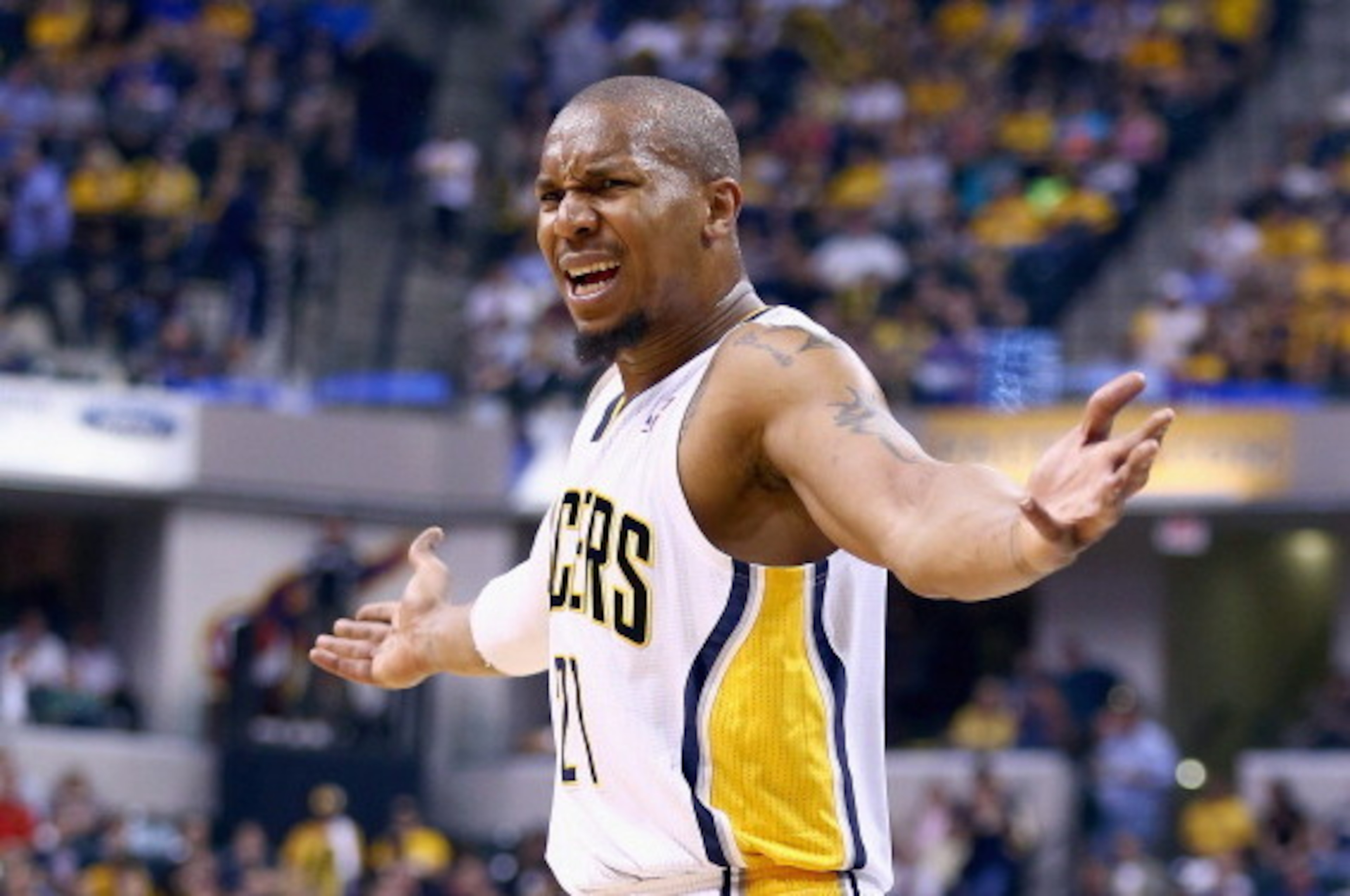 INDIANAPOLIS, IN - MAY 13:  David West #21 of the Indiana Pacers protests being charged with a foul in the 102-79 loss to the Washington Wizards in Game 5 of the Eastern Conference Semifinals during the 2014 NBA Playoffs at Bankers Life Fieldhouse on May 