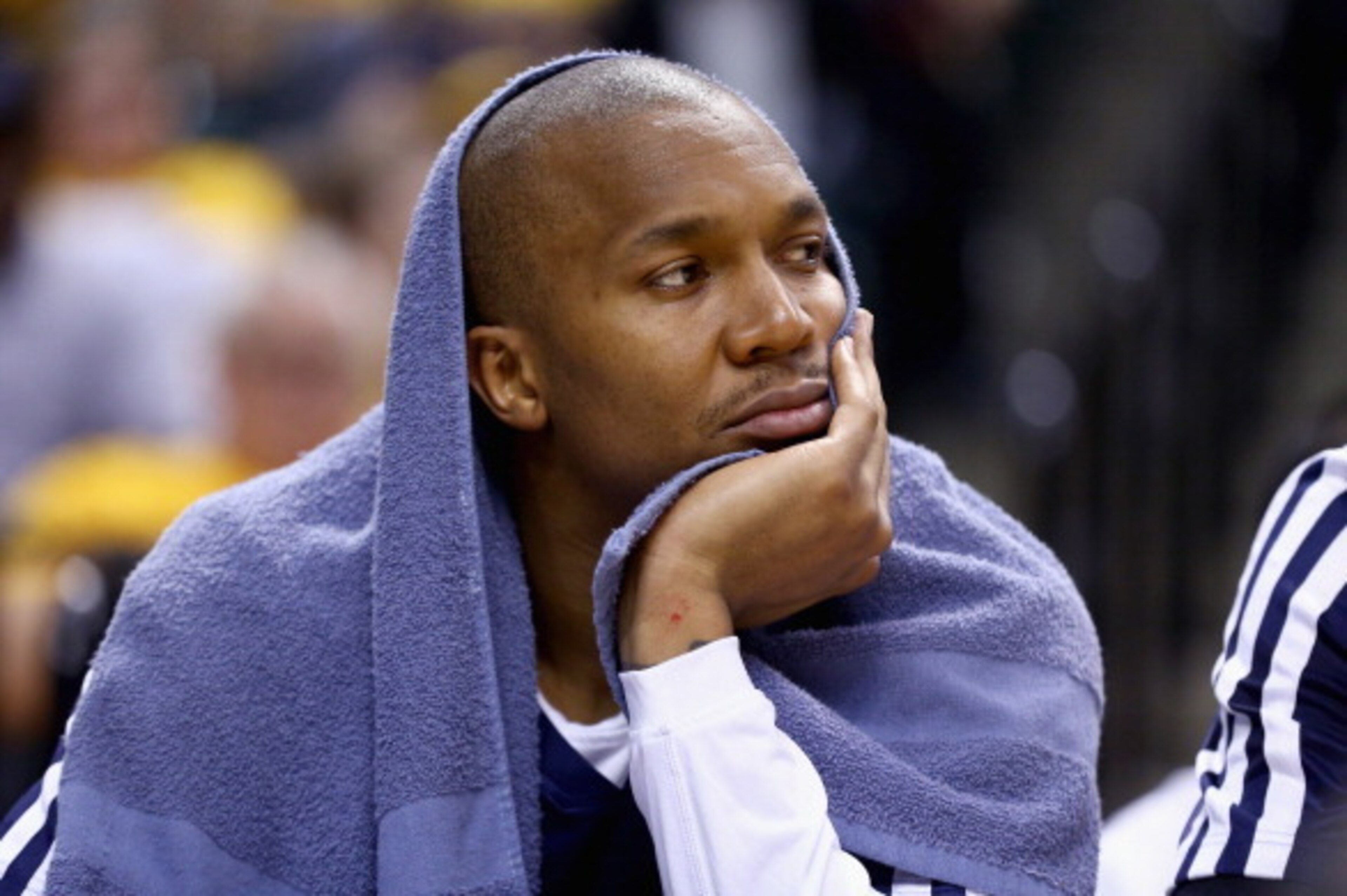 INDIANAPOLIS, IN - MAY 13: David West #21 of the Indiana Pacers watches from the bench in the fourth quater of the 102-79 loss to the Washington Wizards in Game 5 of the Eastern Conference Semifinals during the 2014 NBA Playoffs at Bankers Life Fieldhouse