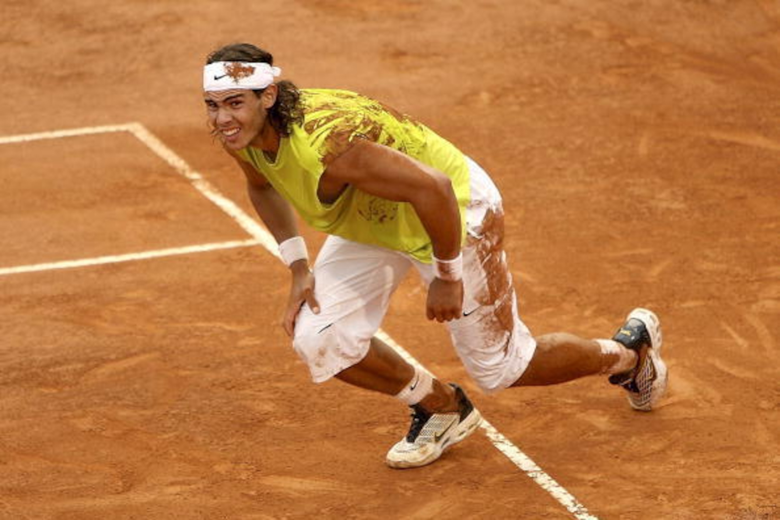 ROME - MAY 14:  Rafael Nadal of Spain celebrates his five set victory against Roger Federer of Switzerland in the final of the ATP Masters Series on May 14, 2006 at the Foro Italico in Rome, Italy.  (Photo by Clive Brunskill/Getty Images)