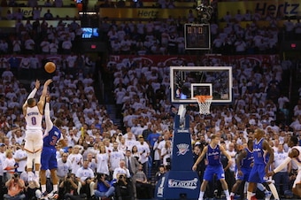 OKLAHOMA CITY, OK - MAY 13: Russell Westbrook #0 of the Oklahoma City Thunder is fouled on a three-point attempt by Chris Paul #3 of the Los Angeles Clippers in Game Five of the Western Conference Semifinals during the 2014 NBA Playoffs at Chesapeake Ene OKLAHOMA CITY, OK - MAY 13: Russell Westbrook #0 of the Oklahoma City Thunder is fouled on a three-point attempt by Chris Paul #3 of the Los Angeles Clippers in Game Five of the Western Conference Semifinals during the 2014 NBA Playoffs at Chesapeake Ene