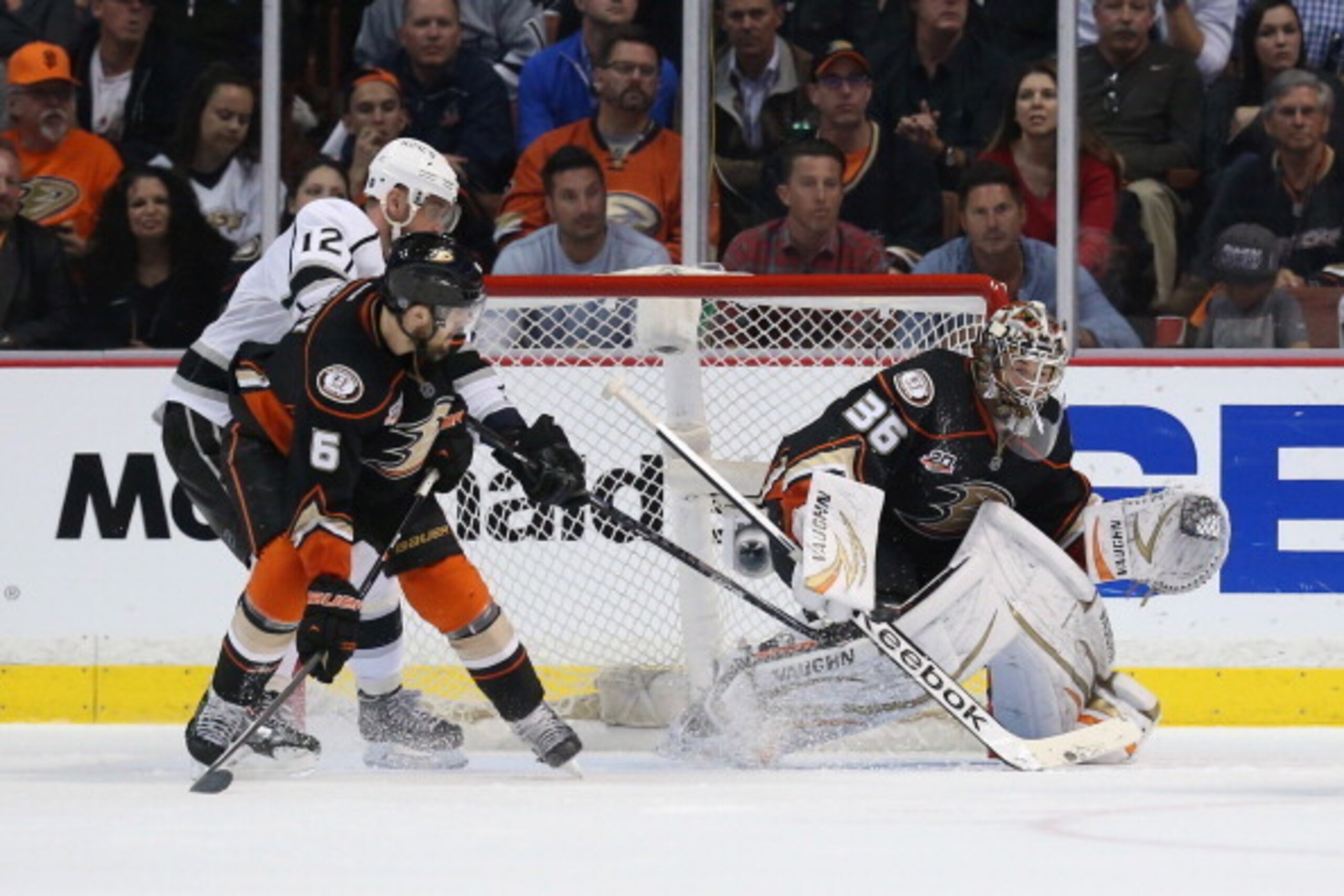 ANAHEIM, CA - MAY 12:  (L-R) Marian Gaborik #12 of the Los Angeles Kings and Ben Lovejoy #6 of the Anaheim Ducks battle in front of the net, as goaltender John Gibson #36 of the Ducks watches the puck in the third period of Game Five of the Second Round o
