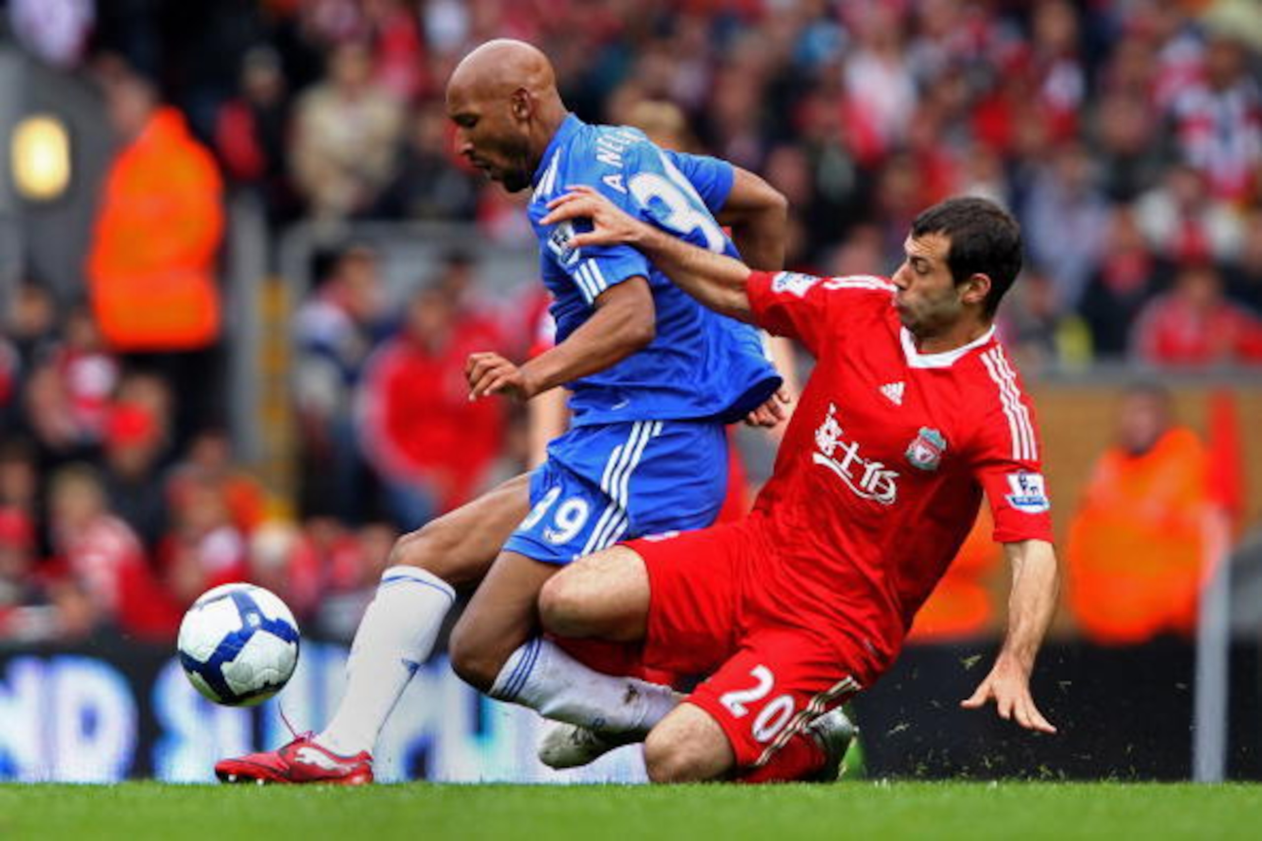 LIVERPOOL, ENGLAND - MAY 02:  Nicolas Anelka of Chelsea is tackled by Javier Mascherano of Liverpool during the Barclays Premier League match between Liverpool and Chelsea at Anfield on May 2, 2010 in Liverpool, England.  (Photo by Clive Brunskill/Getty I