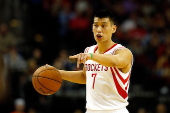 HOUSTON, TX - APRIL 04:  Jeremy Lin #7 of the Houston Rockets points down court against the Oklahoma City Thunder during a game at the Toyota Center on April 4, 2014 in Houston, Texas. NOTE TO USER: User expressly acknowledges and agrees that, by download