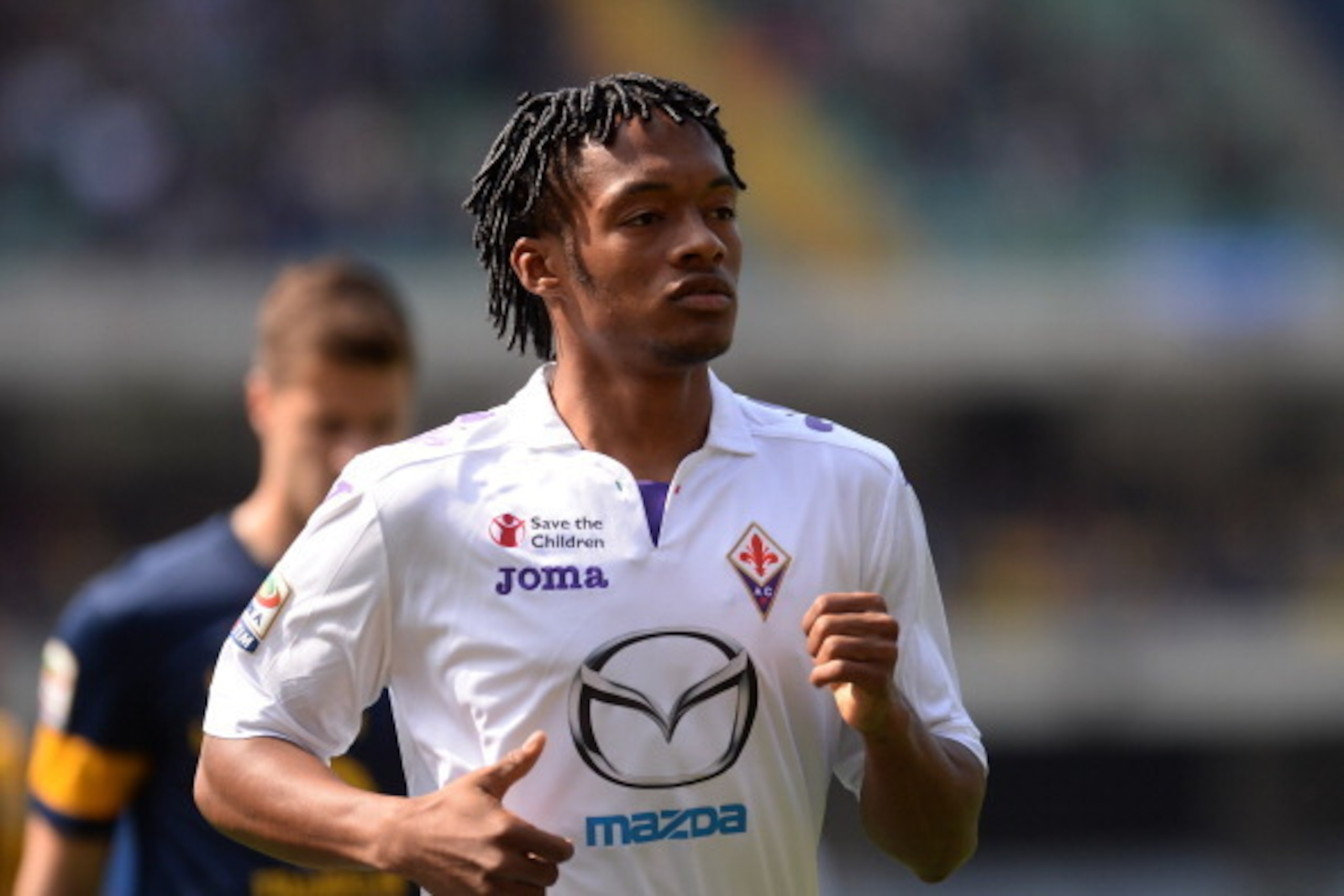 VERONA, ITALY - APRIL 13: Juan Cuadrado of ACF Fiorentina looks on during the Serie A match between Hellas Verona FC and ACF Fiorentina at Stadio Marc'Antonio Bentegodi on April 13, 2014 in Verona, Italy. (Photo by Dino Panato/Getty Images) VERONA, ITALY - APRIL 13: Juan Cuadrado of ACF Fiorentina looks on during the Serie A match between Hellas Verona FC and ACF Fiorentina at Stadio Marc'Antonio Bentegodi on April 13, 2014 in Verona, Italy. (Photo by Dino Panato/Getty Images)