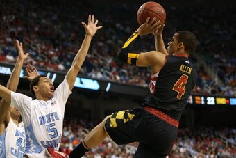 GREENSBORO, NC - MARCH 16:  Seth Allen #4 of the Maryland Terrapins shoots over Marcus Paige #5 of the North Carolina Tar Heels in the first half during the men's ACC Tournament semifinals at Greensboro Coliseum on March 16, 2013 in Greensboro, North Caro