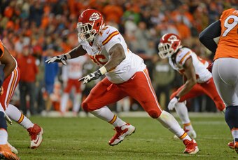 November 17, 2013; Denver, CO, USA; Kansas City Chiefs tackle Branden Albert (76) blocks during the second quarter against the Denver Broncos at Sports Authority Field at Mile High. The Broncos defeated the Chiefs 27-17. Mandatory Credit: Kyle Terada-USA