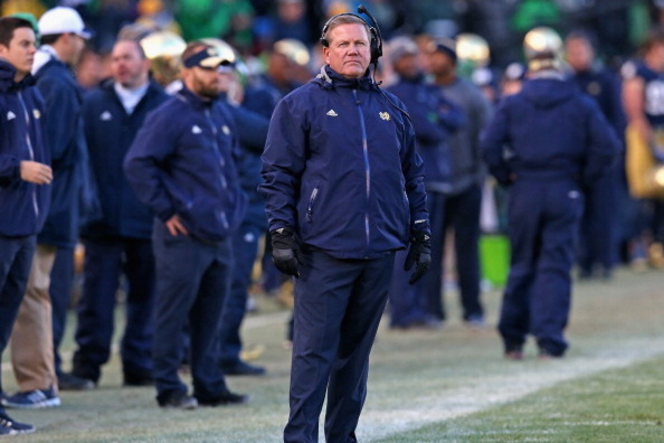 SOUTH BEND, IN - NOVEMBER 02:  Head coach Brian Kelly of the Notre Dame Fighting Irish walks the sidelines during a game against the Navy Midshipmen at Notre Dame Stadium on November 2, 2013 in South Bend, Indiana. Notre Dame defeated Navy 38-34.  (Photo