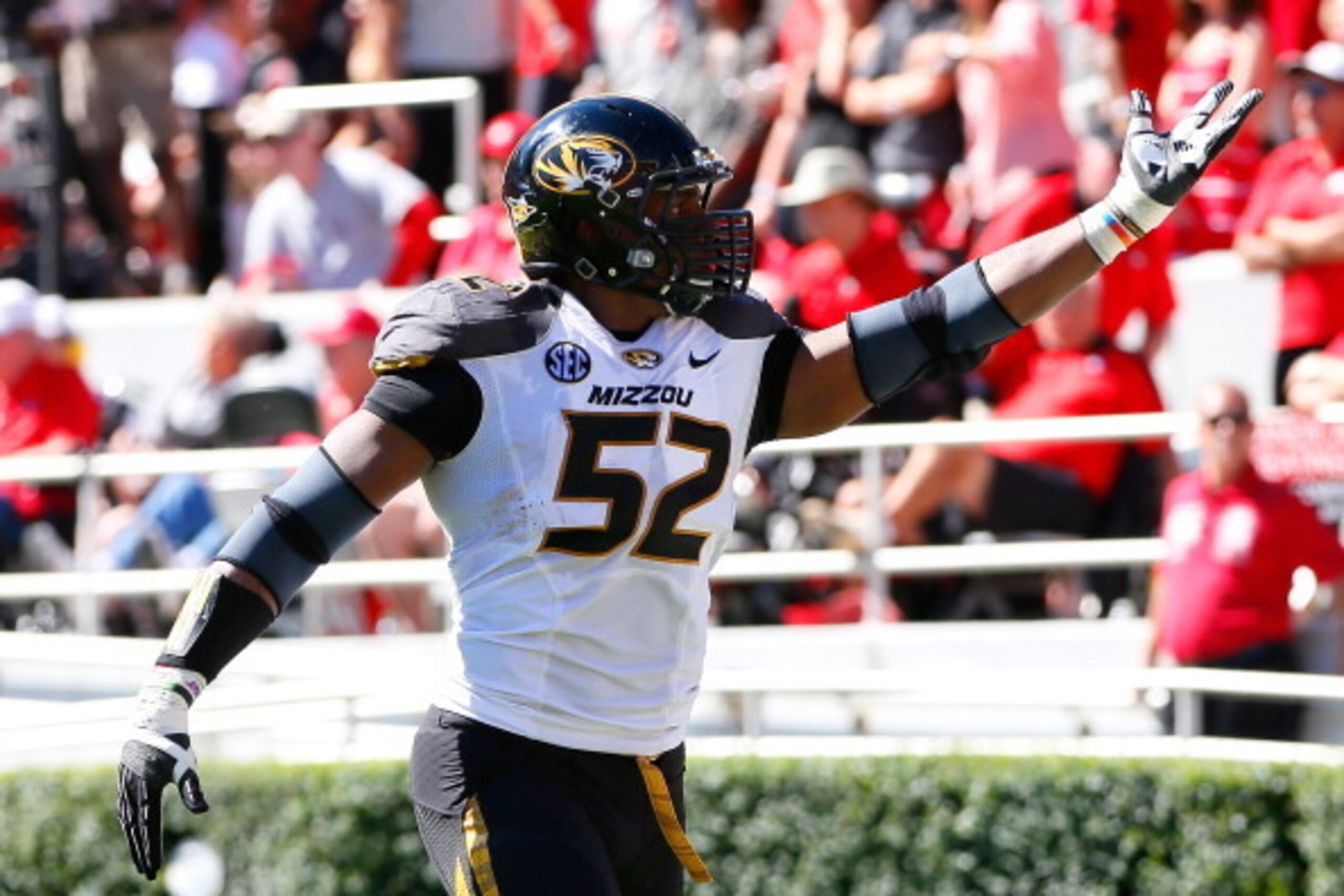 ATHENS, GA - OCTOBER 12:  Michael Sam #52 of the Missouri Tigers recovers a fumble for a touchdown against the Georgia Bulldogs at Sanford Stadium on October 12, 2013 in Athens, Georgia.  (Photo by Kevin C. Cox/Getty Images)