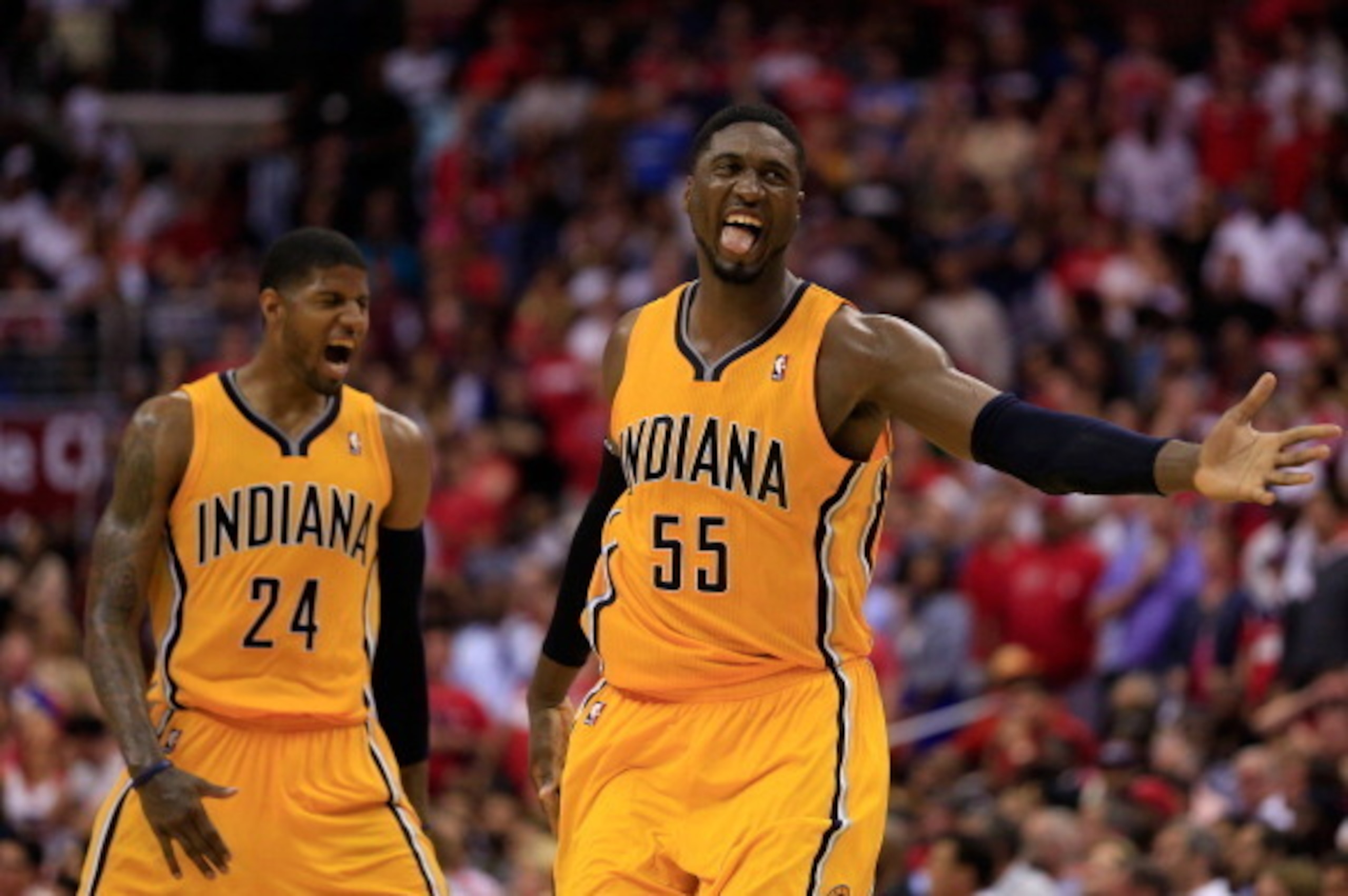WASHINGTON, DC - MAY 11:  Roy Hibbert #55 of the Indiana Pacers and teammate Paul George #24 celebrate after Hibbert scored a basket late in the fourth quarter of the Pacers 95-92 win over the Washington Wizards during Game Four of the Eastern Conference 