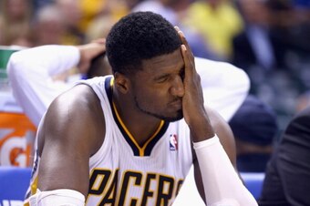INDIANAPOLIS, IN - MAY 13:  Roy Hibbert #55 of the Indiana Pacers finds it hard to watch from the bench in the fourth quater of the 102-79 loss to the Washington Wizards in Game 5 of the Eastern Conference Semifinals during the 2014 NBA Playoffs at Banker