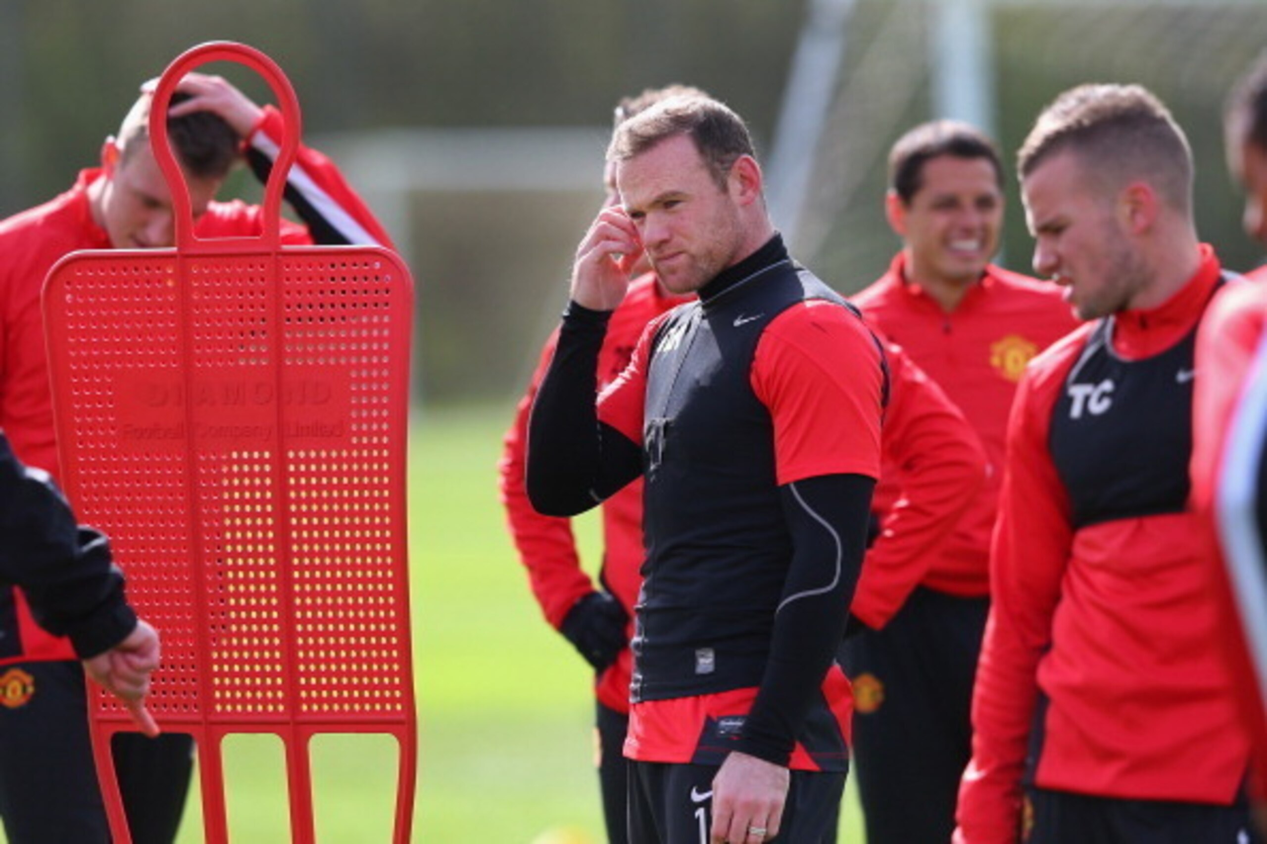MANCHESTER, ENGLAND - APRIL 08:  Wayne Rooney of Manchester United looks on during a training session at Aon Training Complex on April 8, 2014 in Manchester, England.  (Photo by Alex Livesey/Getty Images)