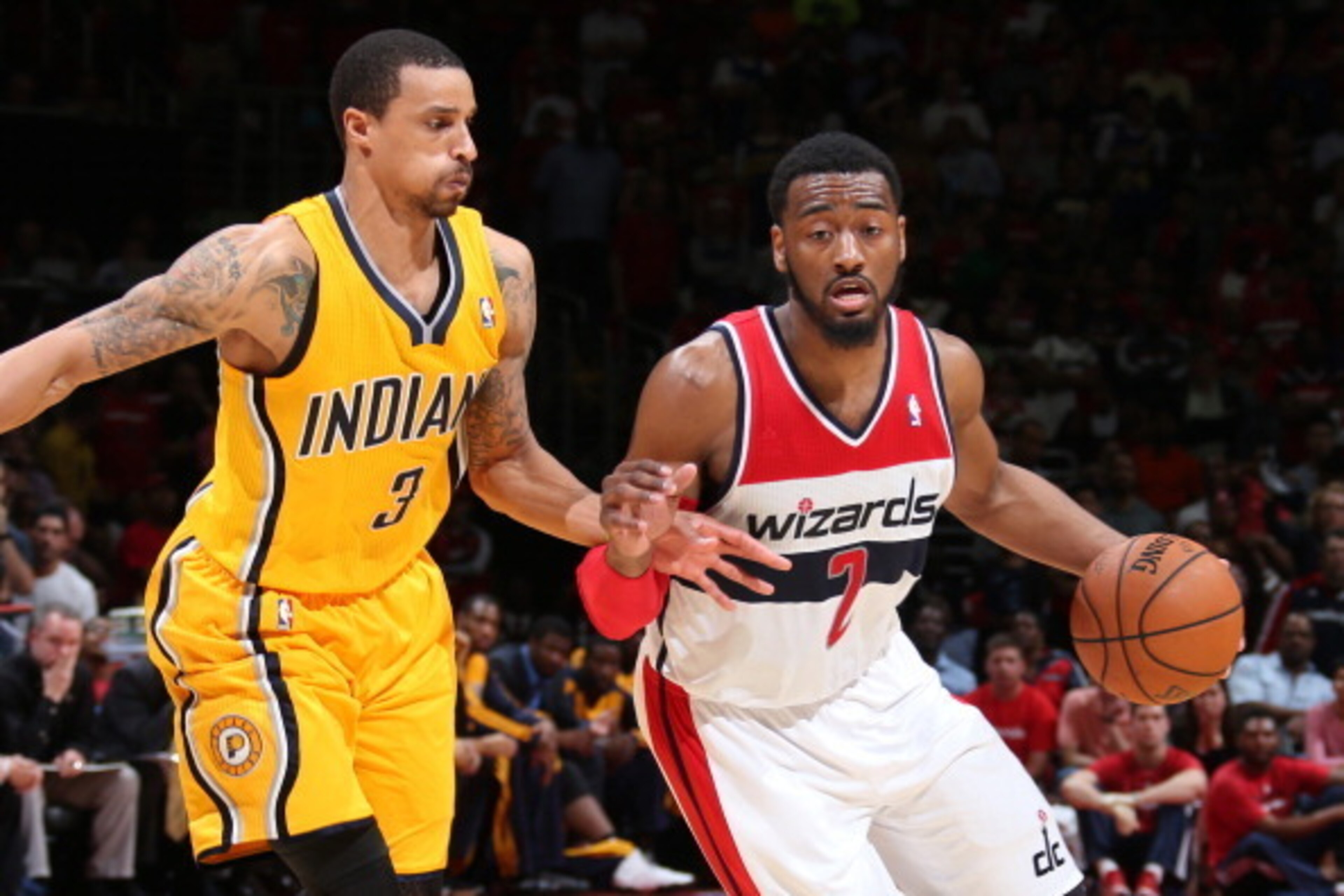 WASHINGTON, DC - MAY 11: John Wall #2 of the Washington Wizards handles the ball against the Indiana Pacers in Game Four of the Eastern Conference Semifinals at Verizon Center on May 11, 2014 in Washington, DC. NOTE TO USER: User expressly acknowledges an