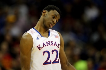 KANSAS CITY, MO - MARCH 14:  Andrew Wiggins #22 of the Kansas Jayhawks walks off the court after the Jayhawks were deated by the Iowa State Cyclones in the Big 12 Basketball Tournament semifinal game at Sprint Center on March 14, 2014 in Kansas City, Miss