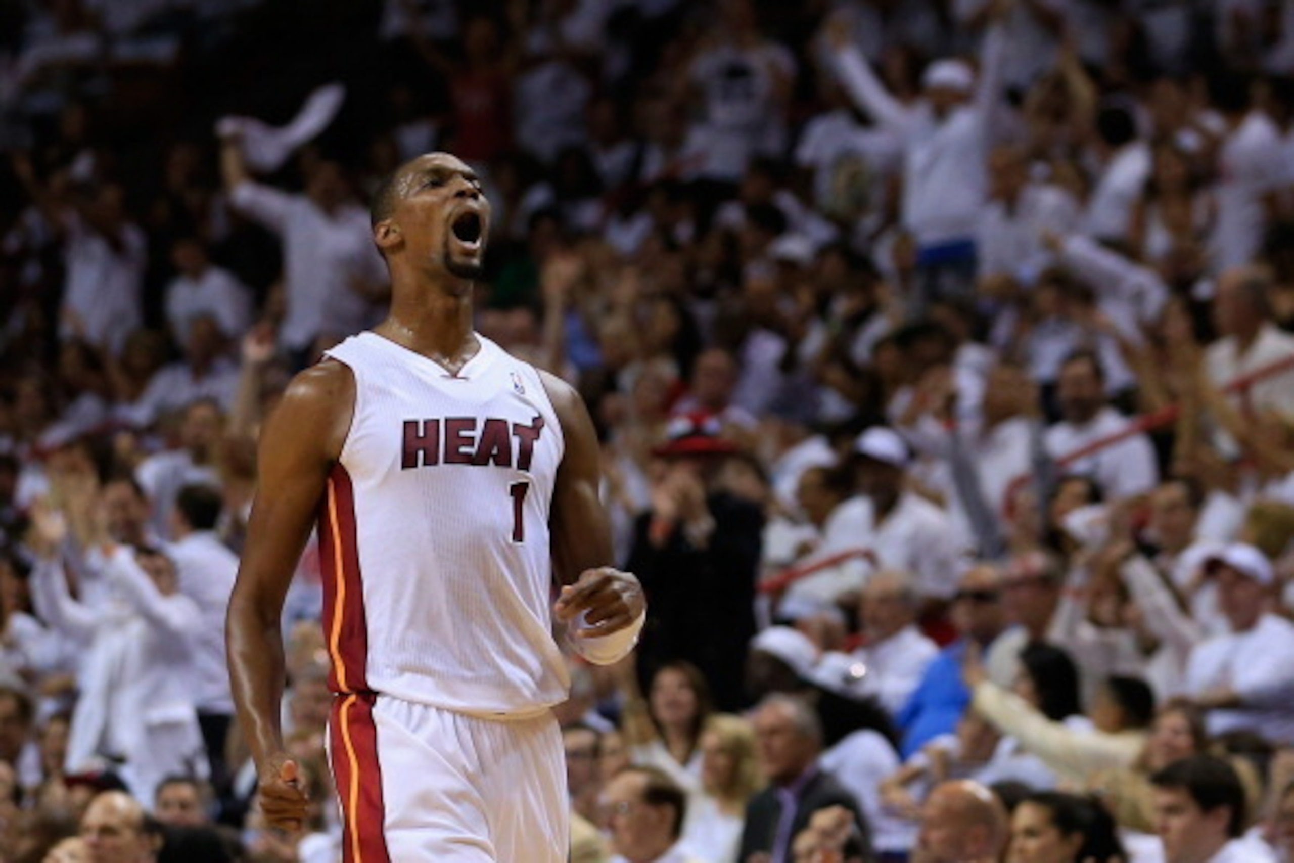 MIAMI, FL - MAY 08: Chris Bosh #1 of the Miami reacts after scoring against the Brooklyn Nets during Game Two of the Eastern Conference Semifinals of the 2014 NBA Playoffs at American Airlines Arena on May 8, 2014 in Miami, Florida. NOTE TO USER: User ex MIAMI, FL - MAY 08: Chris Bosh #1 of the Miami reacts after scoring against the Brooklyn Nets during Game Two of the Eastern Conference Semifinals of the 2014 NBA Playoffs at American Airlines Arena on May 8, 2014 in Miami, Florida. NOTE TO USER: User ex
