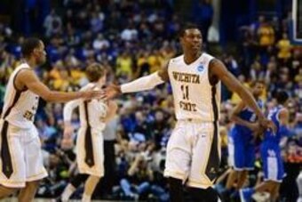 Mar 23, 2014; St. Louis, MO, USA; Wichita State Shockers forward Cleanthony Early (11) slaps five with Tekele Cotton (32) against the Kentucky Wildcats during the second half in the third round of the 2014 NCAA Men's Basketball Championship at Scottrade C