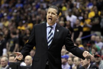 ST LOUIS, MO - MARCH 23:  Head coach John Calipari of the Kentucky Wildcats shouts to his team against the Wichita State Shockers during the third round of the 2014 NCAA Men's Basketball Tournament at Scottrade Center on March 23, 2014 in St Louis, Missou