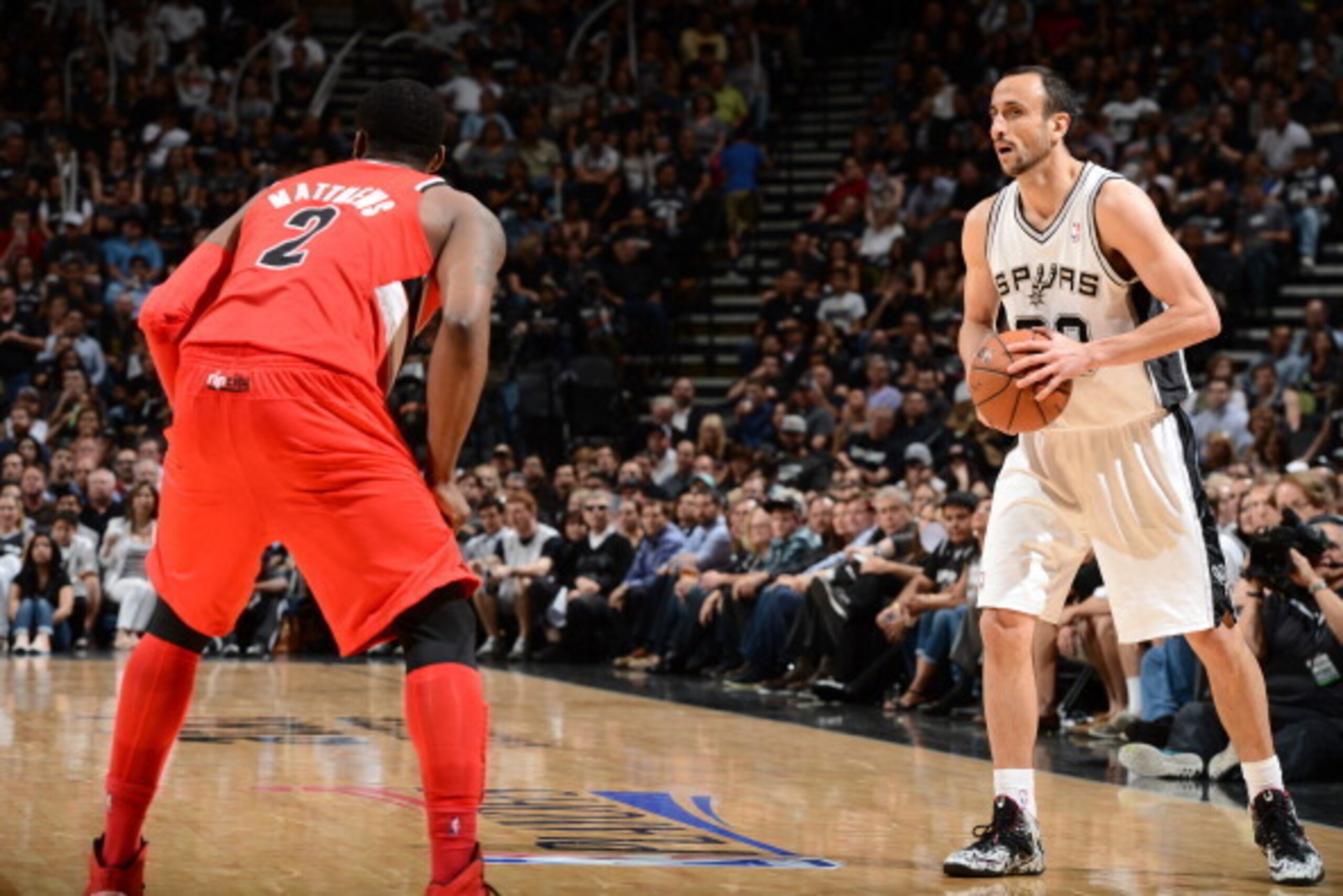 SAN ANTONIO, TX - MAY 14: Manu Ginobili #20 of the San Antonio Spurs handles the ball against the Portland Trail Blazers in Game Five of the Western Conference Semifinals during the 2014 NBA Playoffs on May 14, 2014 at the AT&T Center in San Antonio, Texa